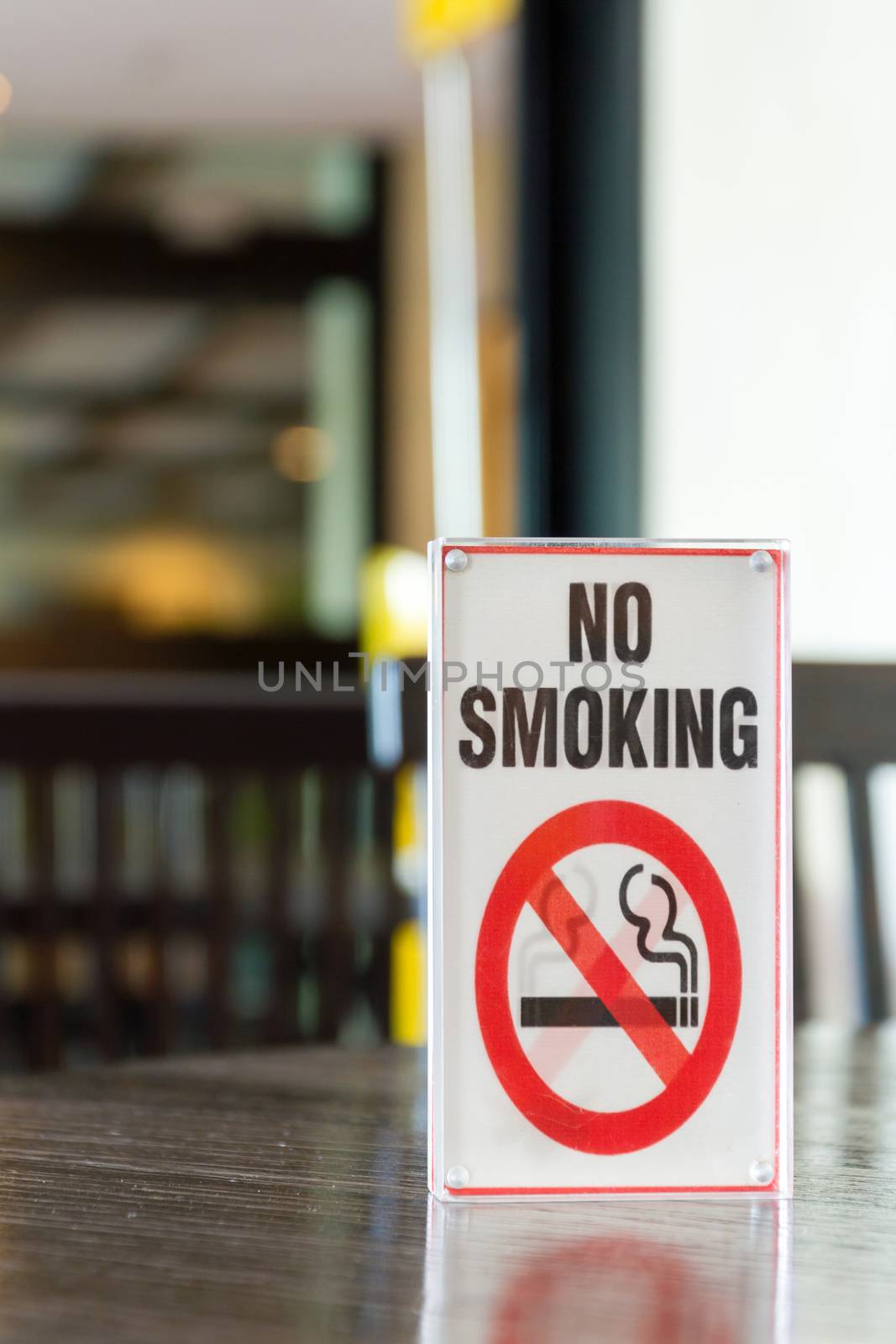 Signs of non smoking in restaurant . by ronnarong