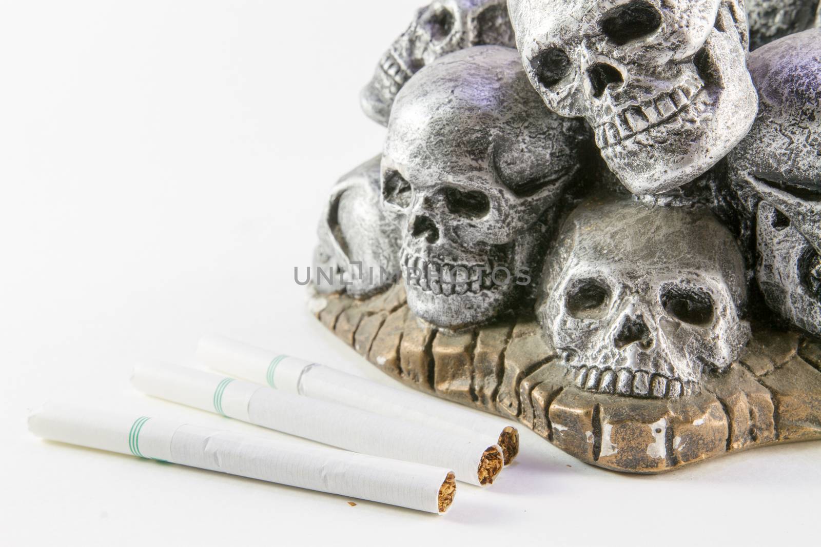 Anti smoking concept with cigarettes and skull by ronnarong