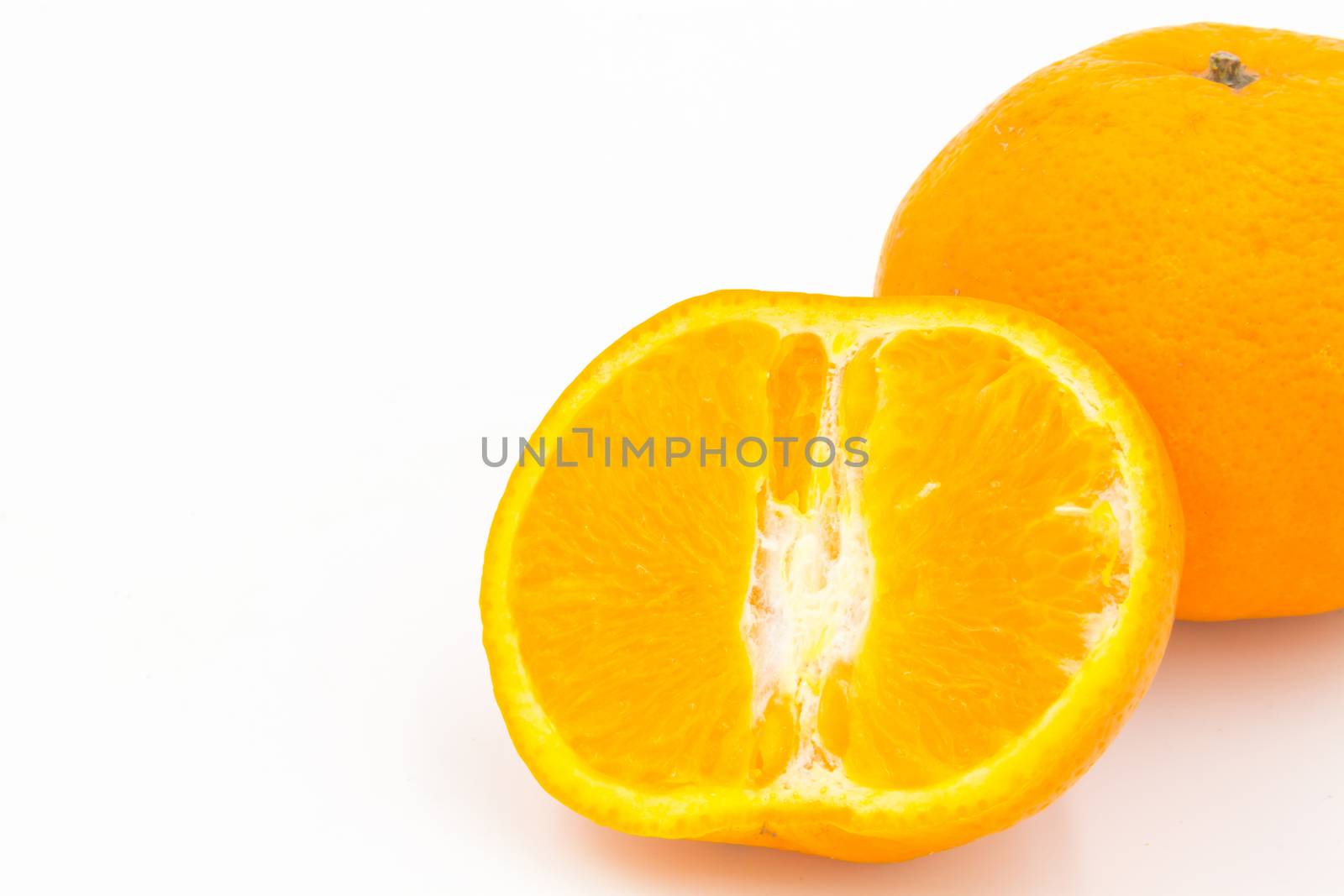 Orange fruit on white background by ronnarong