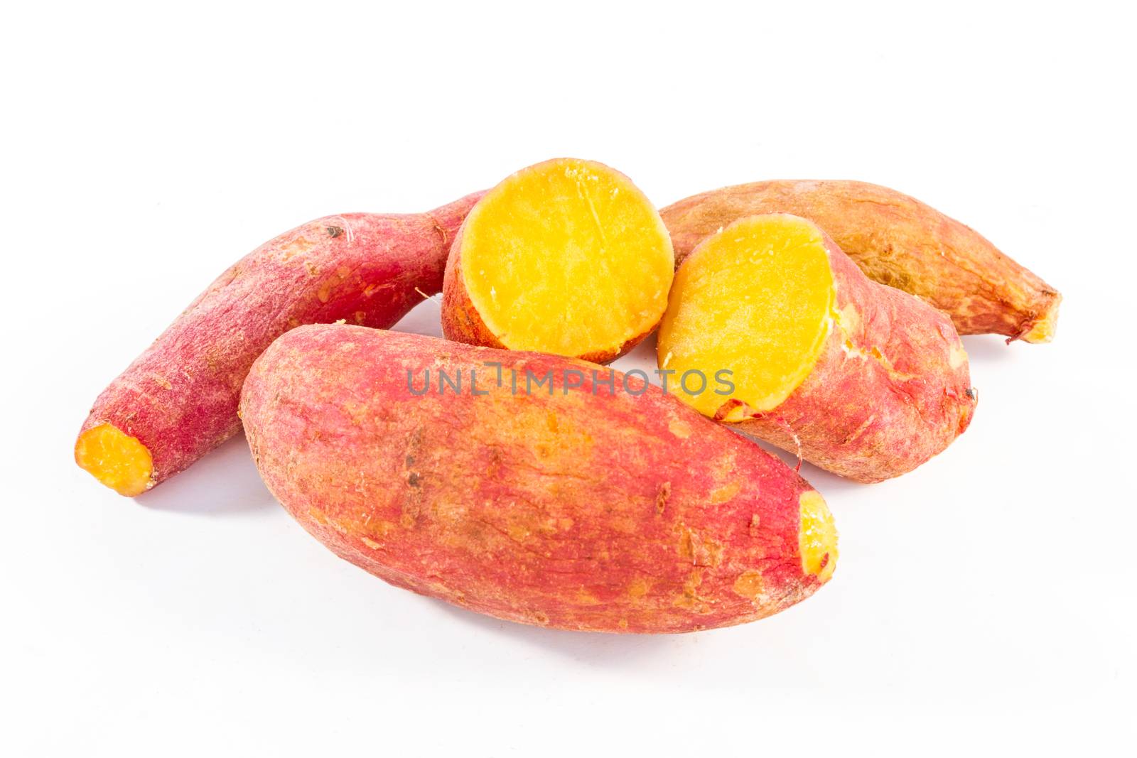 Sweet potato isolated on white background by ronnarong
