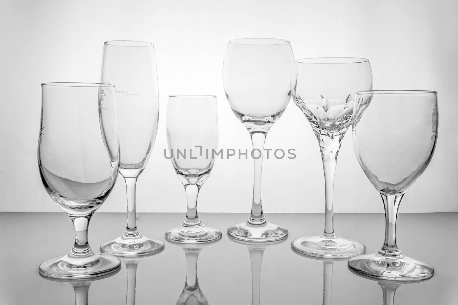 Collage of empty glasses by ronnarong