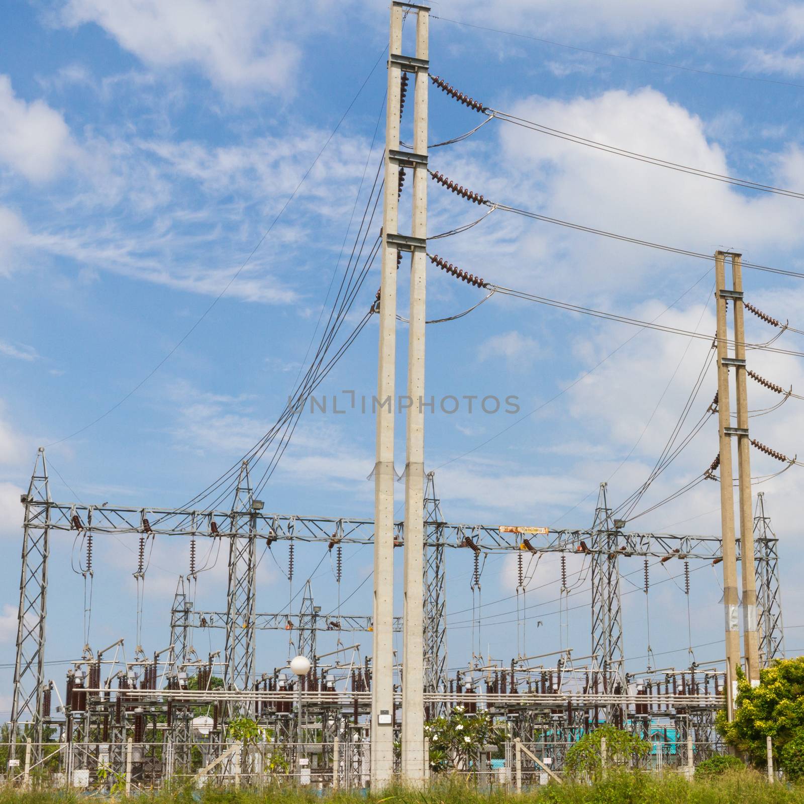 Electricity station, Electricity plant landscape over blue sky  by ronnarong