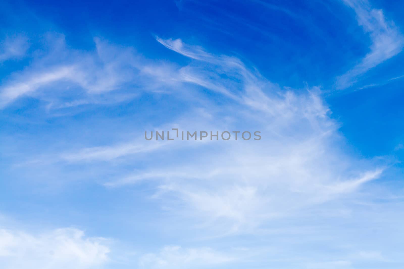 Blue sky background with white clouds.Blur or Defocus image. by ronnarong