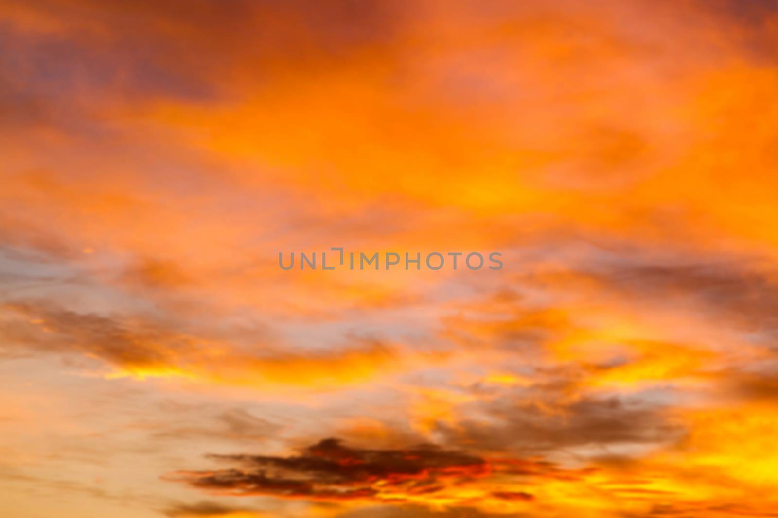 Dramatic sunrise sky with clouds.Blur or Defocus image.