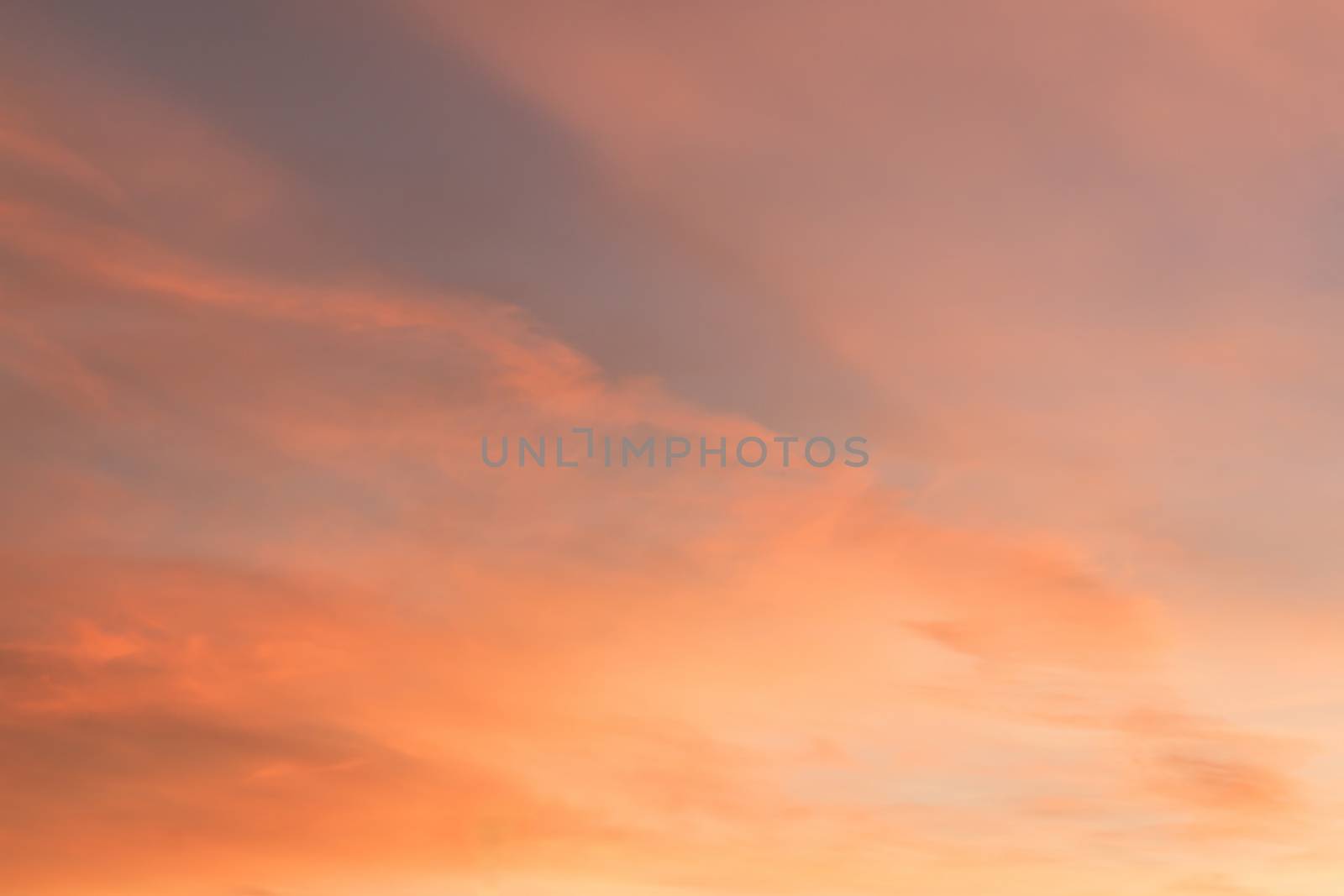 Dramatic sunrise sky with clouds.Blur or Defocus image.