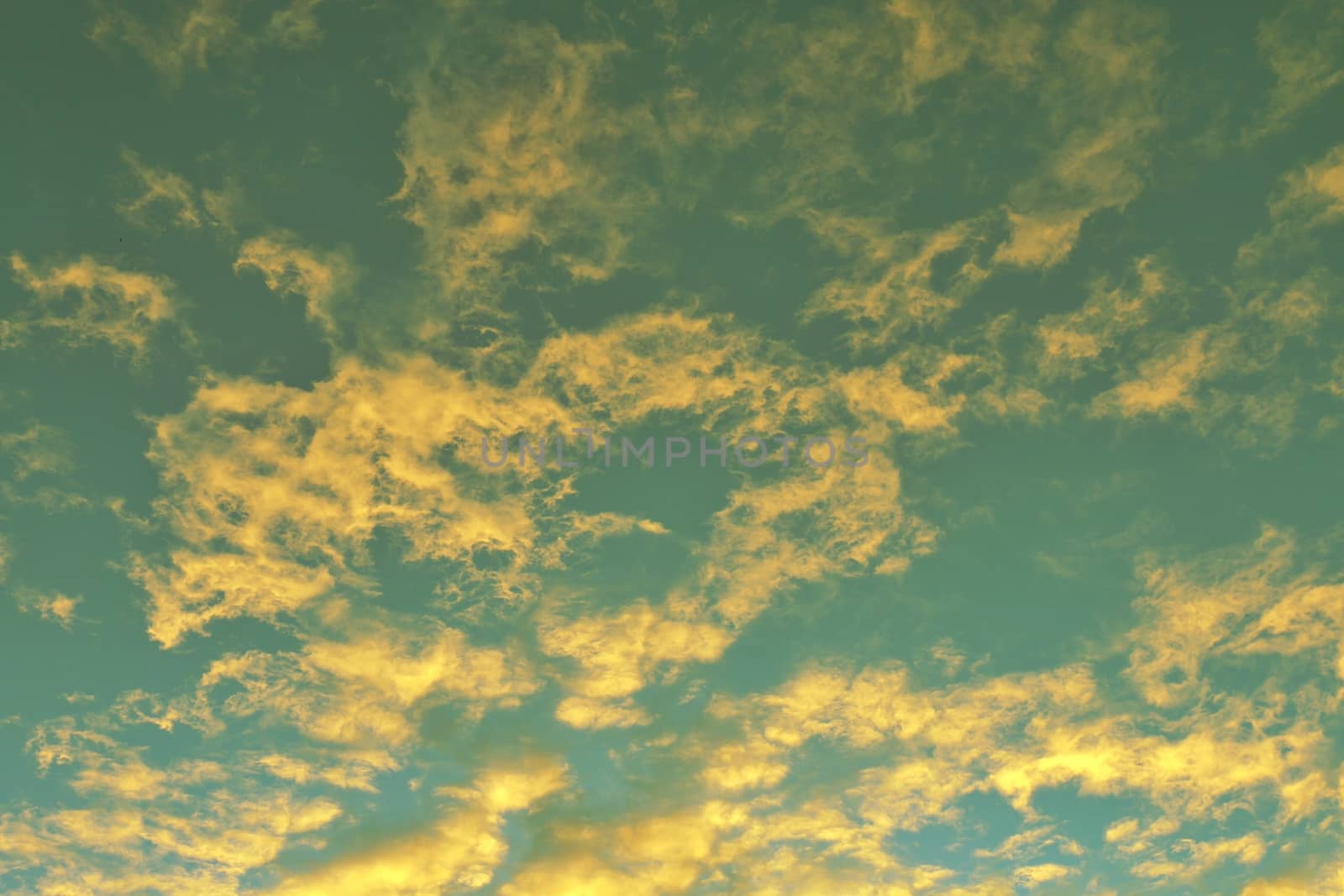 Global warming, twilight sky evening time, sunshine yellow gold on cloud blue sky background by cgdeaw