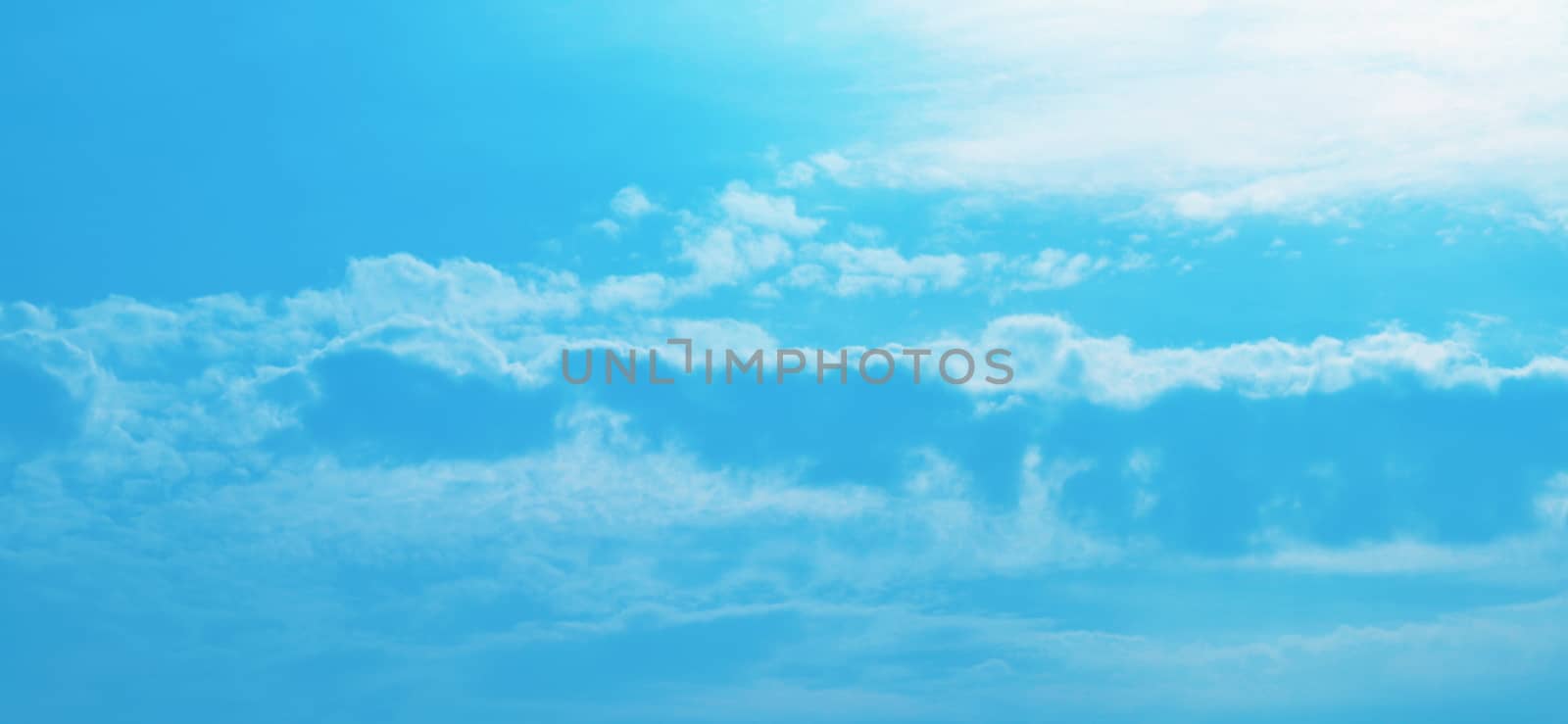 Beautiful blue sky with clouds background and bright lighting clear on Summer
