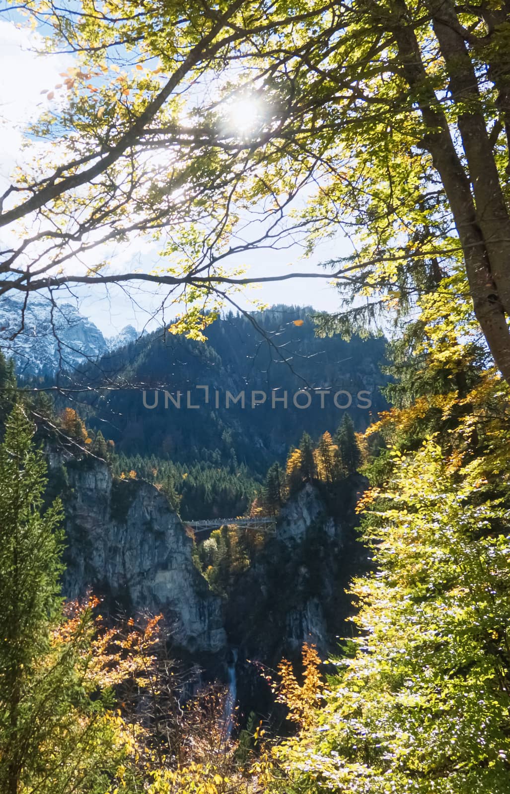 Beautiful nature of European Alps, landscape view of alpine mountains, lake and village on a sunny day, travel and destination by Anneleven