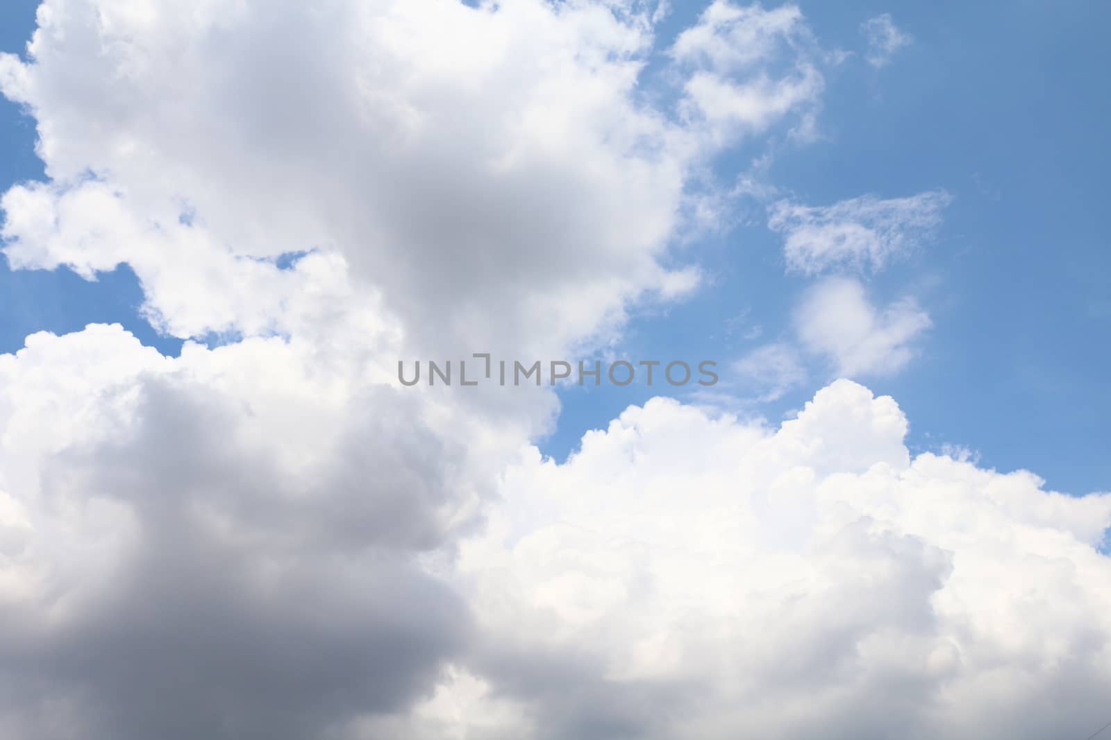 Beautiful blue sky with clouds for background and bright lighting clear on Summer