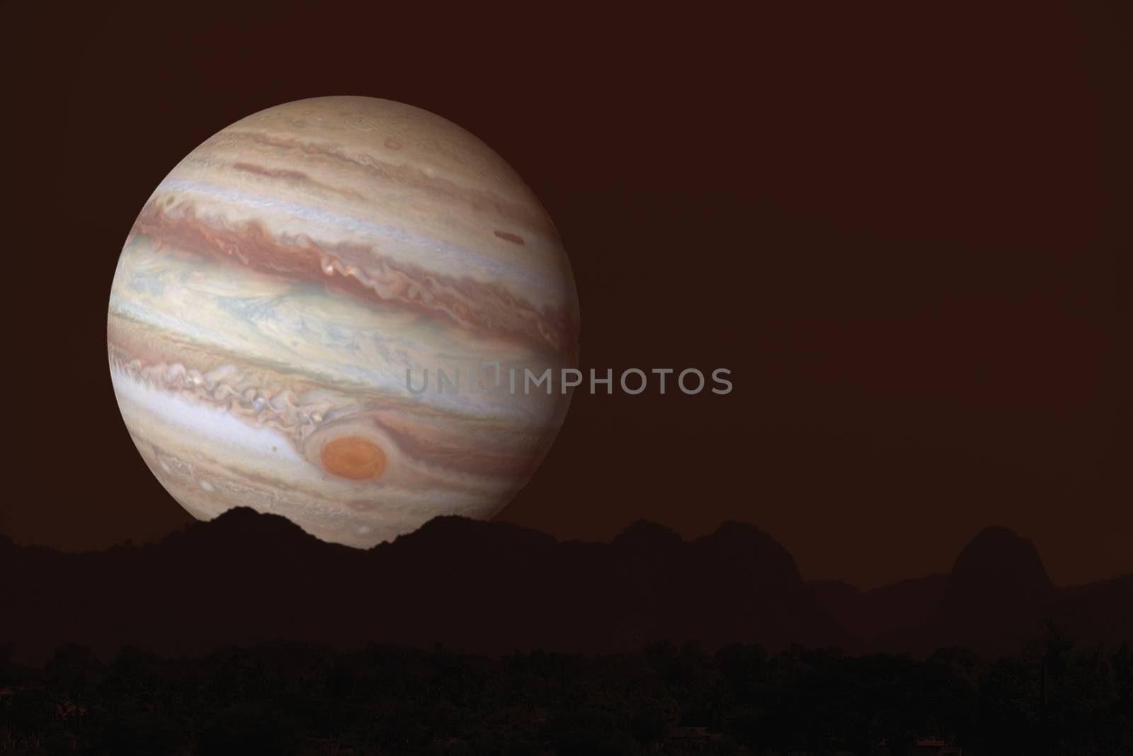 Jupiter silhouette mountain on cloud and night sky, Elements of this image furnished by NASA