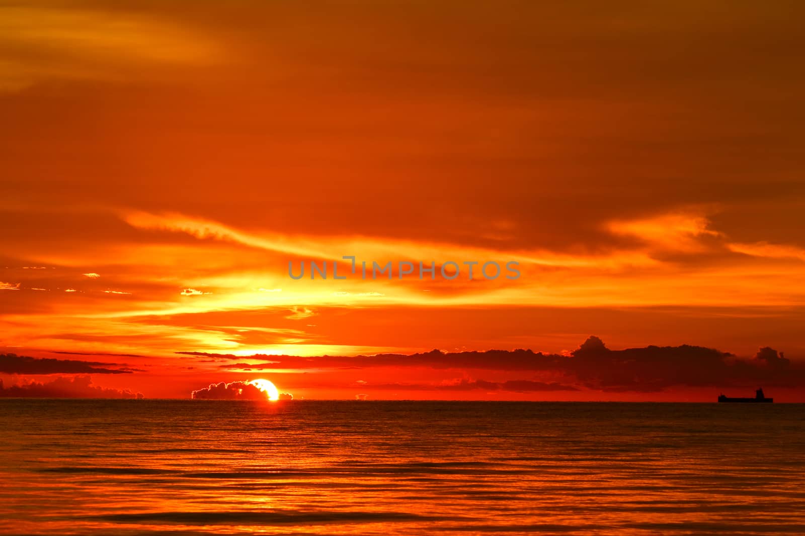 sunset on sea and ocean last light red and orange sky silhouette cloud