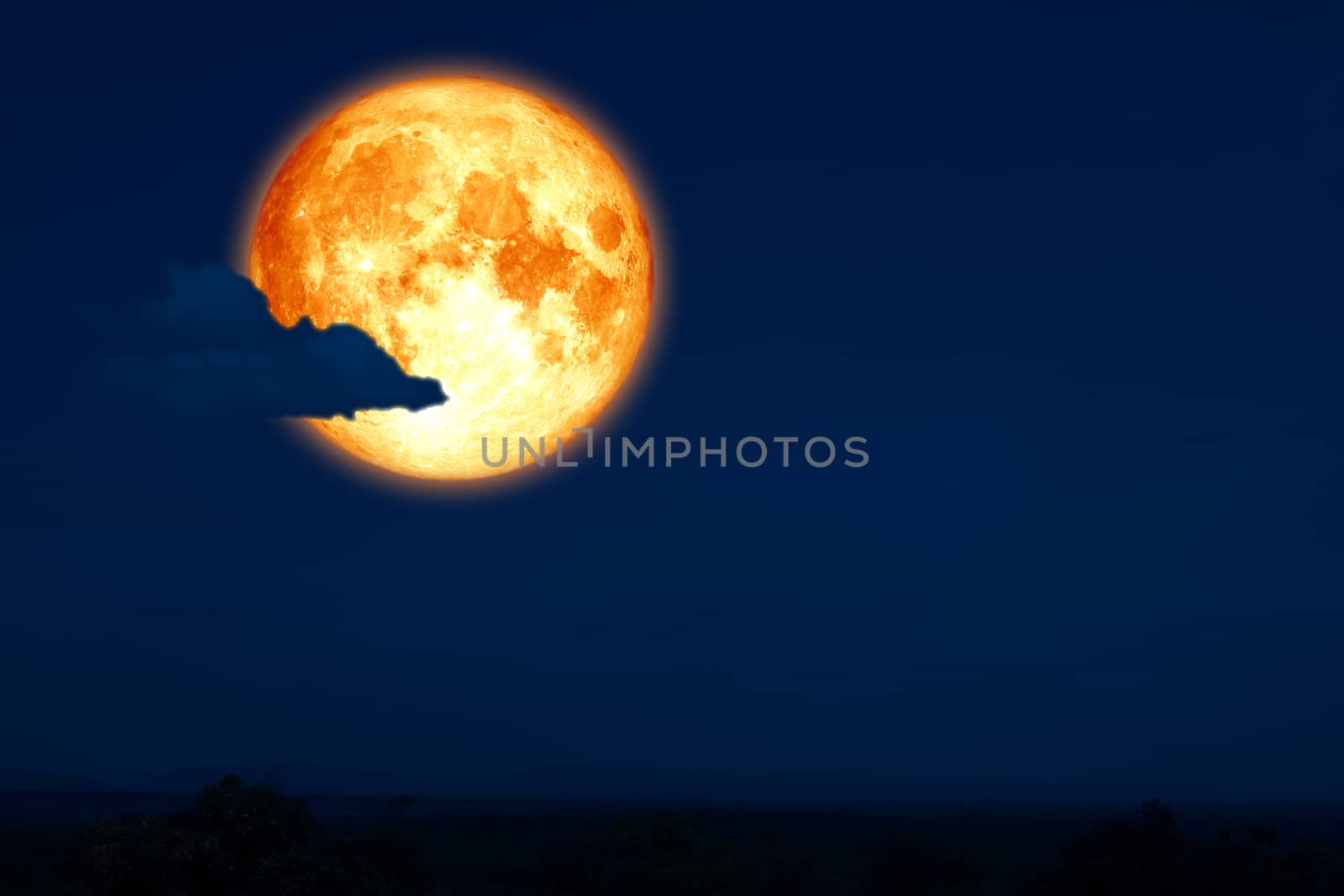 full egg moon back on silhouette mountain on night sky, Elements of this image furnished by NASA