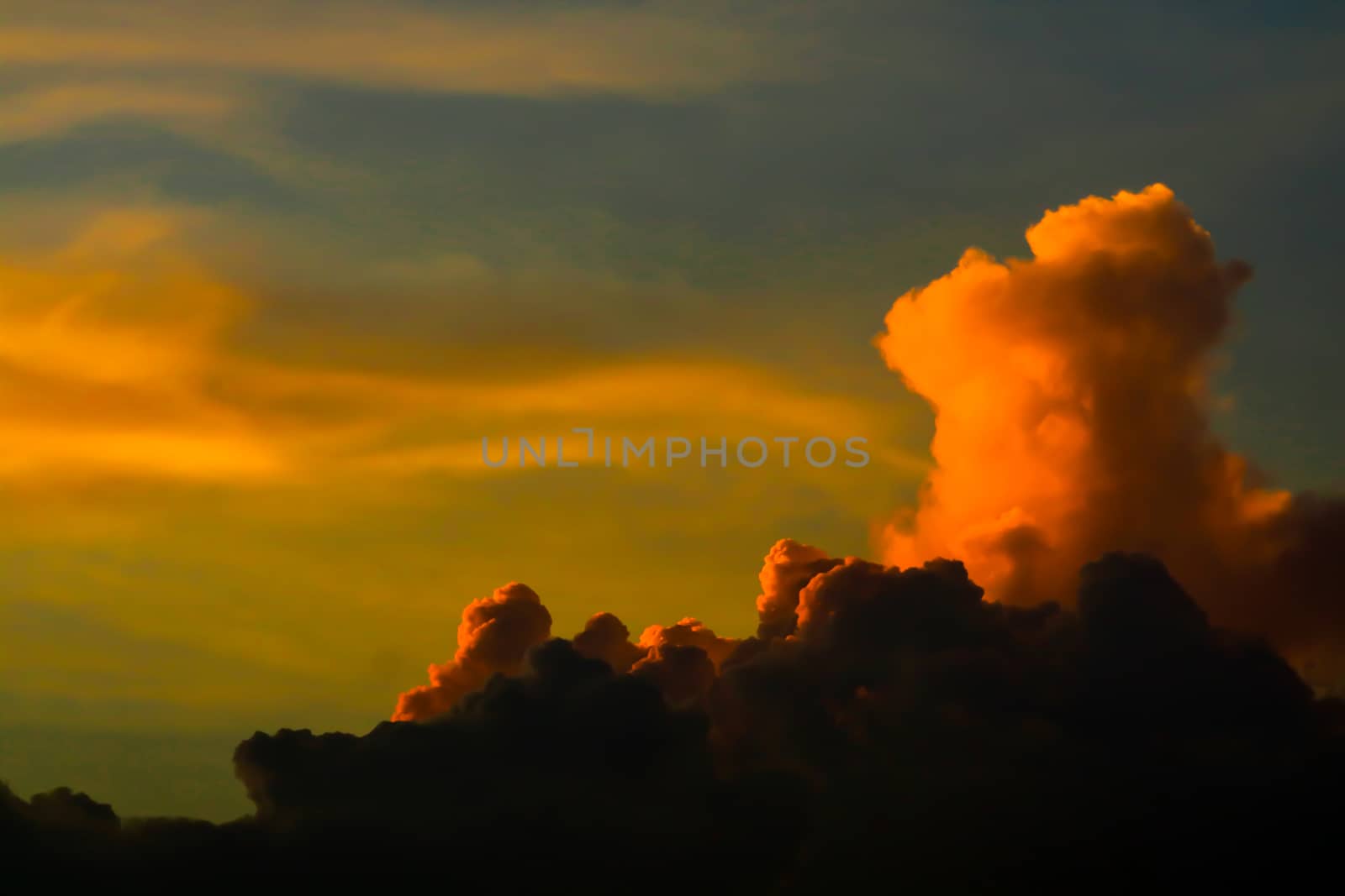 sunset silhouette orange cloud sunshine in dark sky soft cloud background