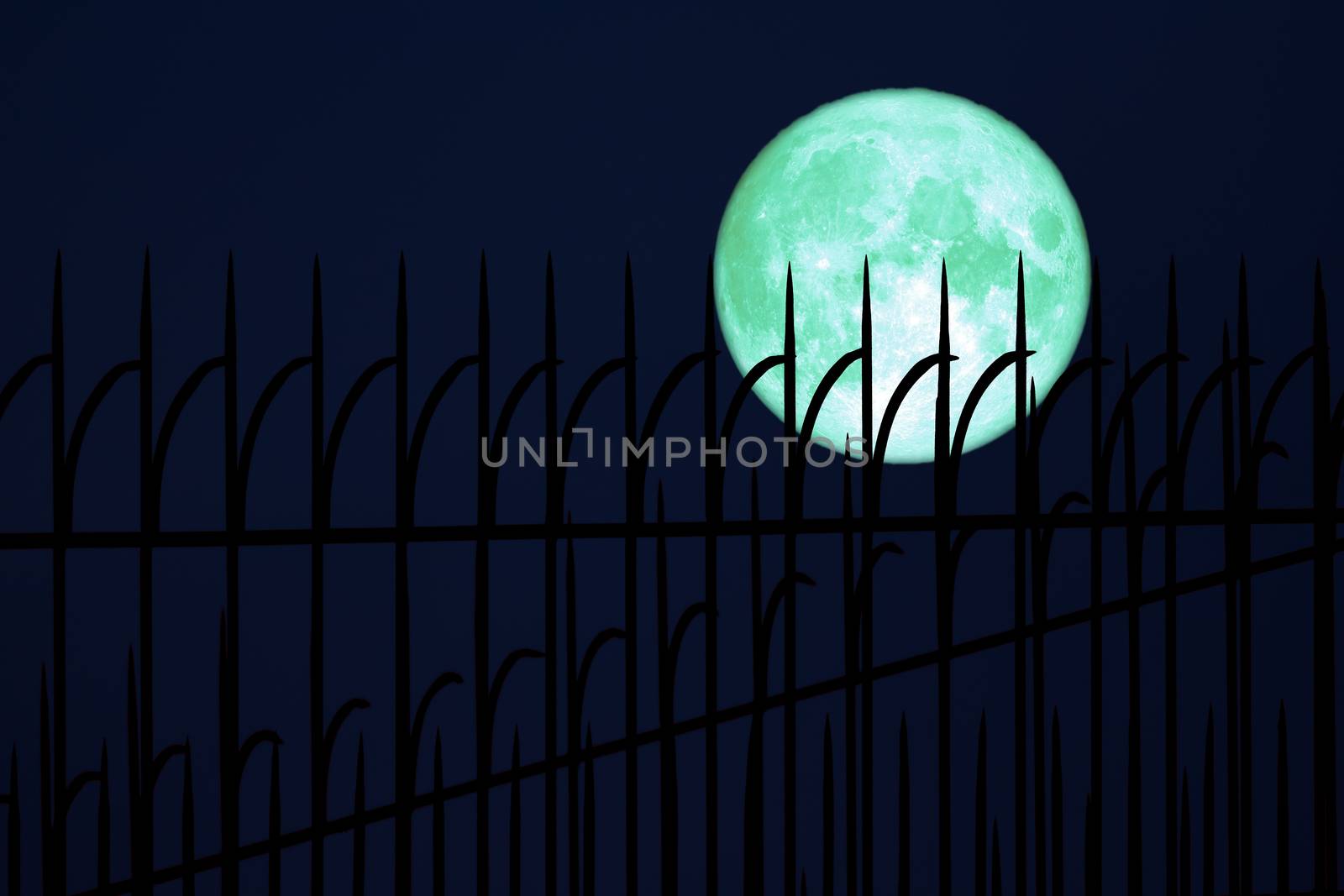 full egg moon back on silhouette Iron fence on night sky, Elements of this image furnished by NASA