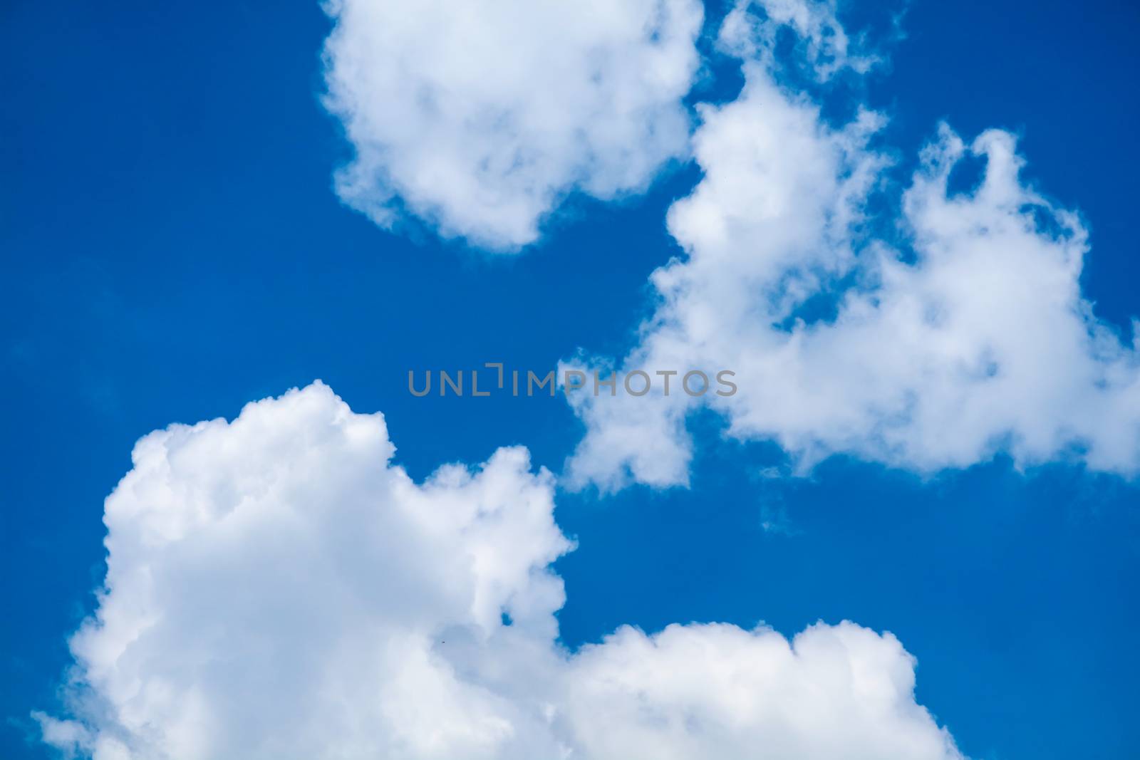 white heap cloud sunshine in tropical  blue sky soft cloud background