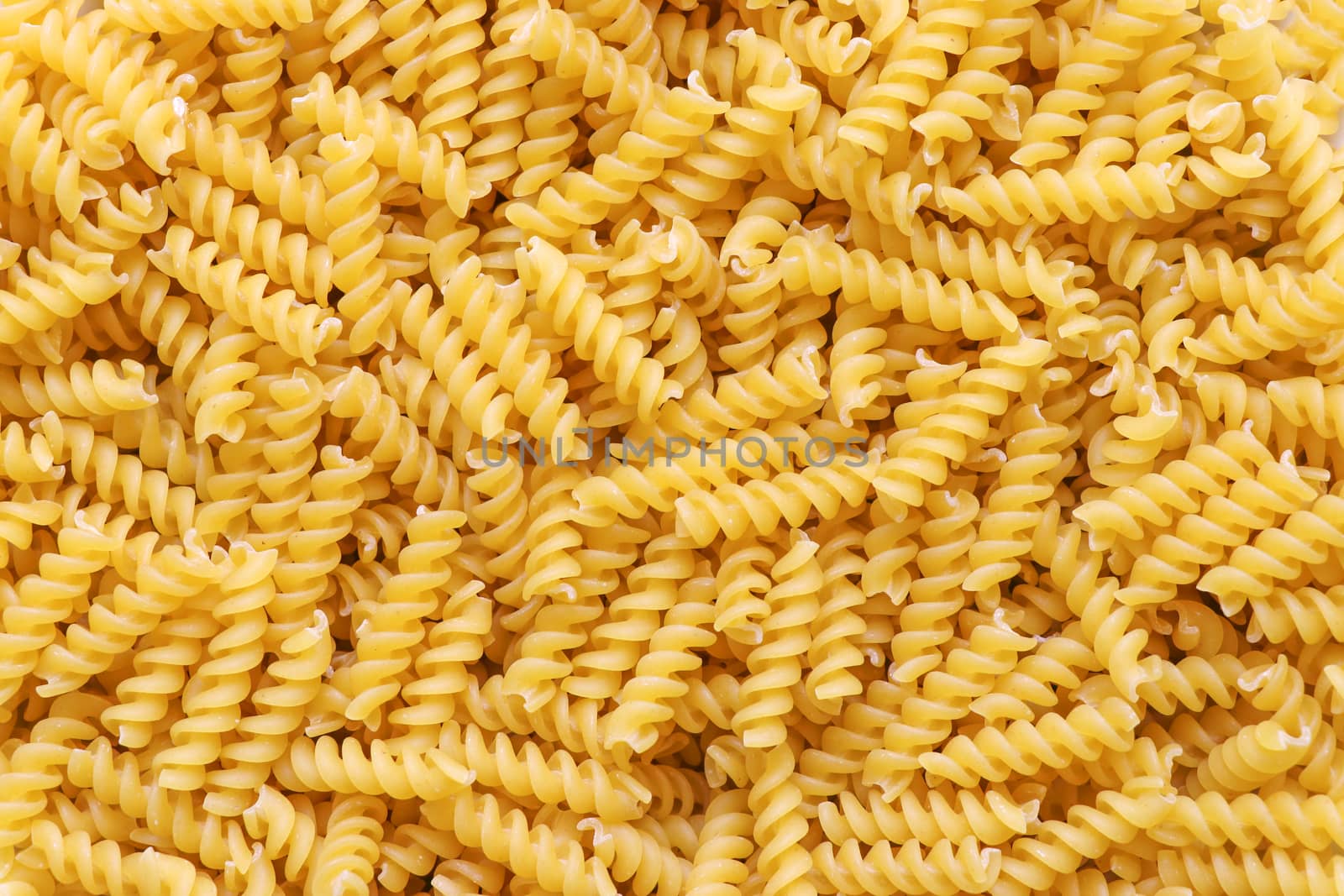 Fusilli spaghetti pattern background. Fusilli background.