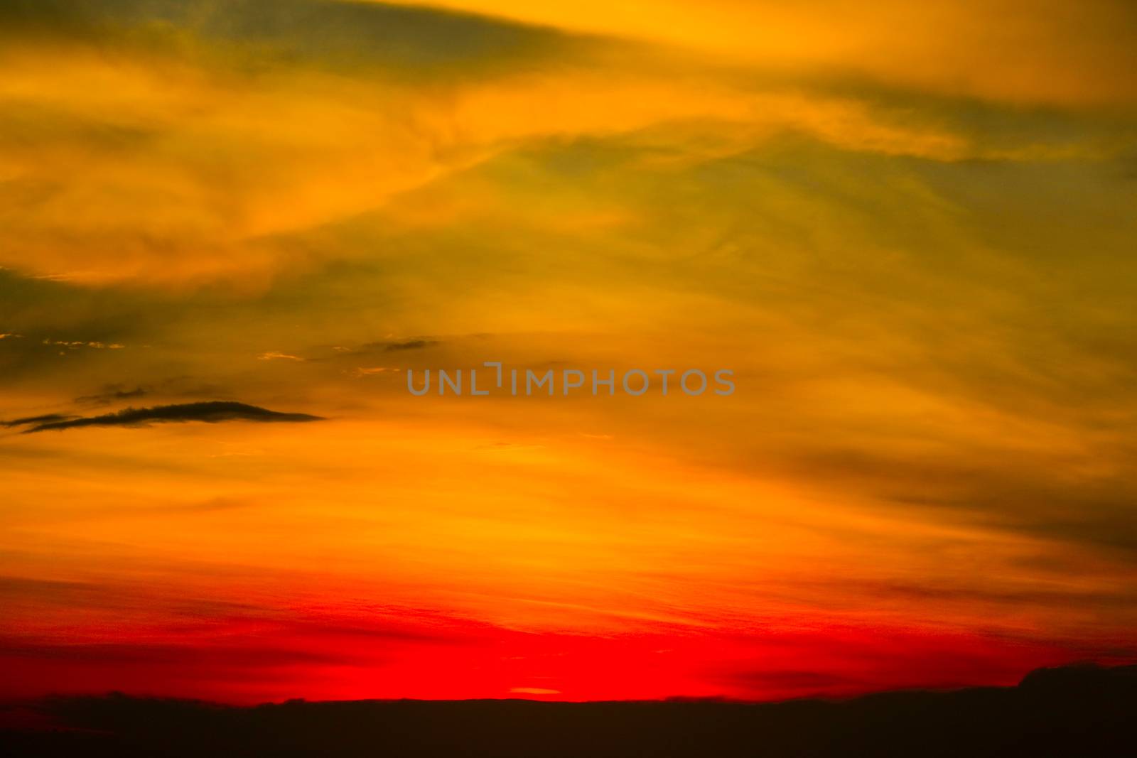 blurred sunset heap cloud in tropical and orange sky soft cloud background