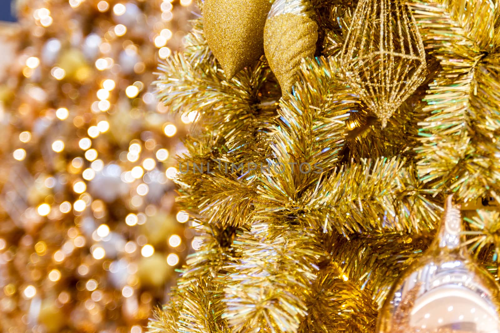 Hanging decorations Festive decorations, such as Christmas and Happy new year bokeh golden light background