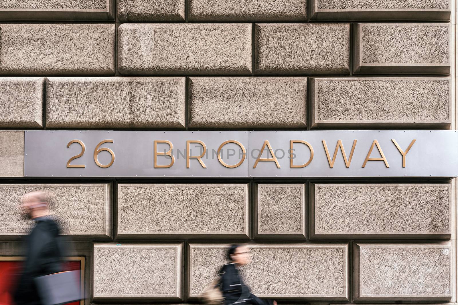 Broadway Street "26 BROADWAY" sign and wall street over vintage wall beside the street, Broadway is a road in the U.S. state of New York, Business and sing of landmark concept
