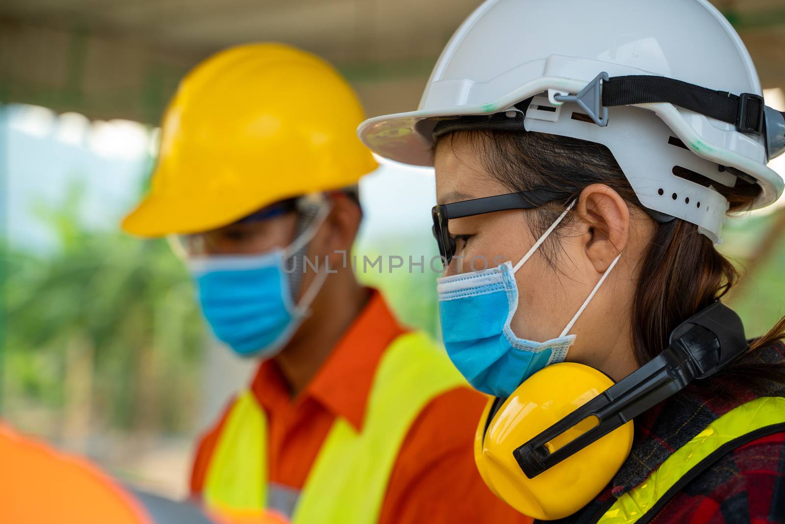 Engineer wearing protective mask to Protect Against Covid-19 by Visoot