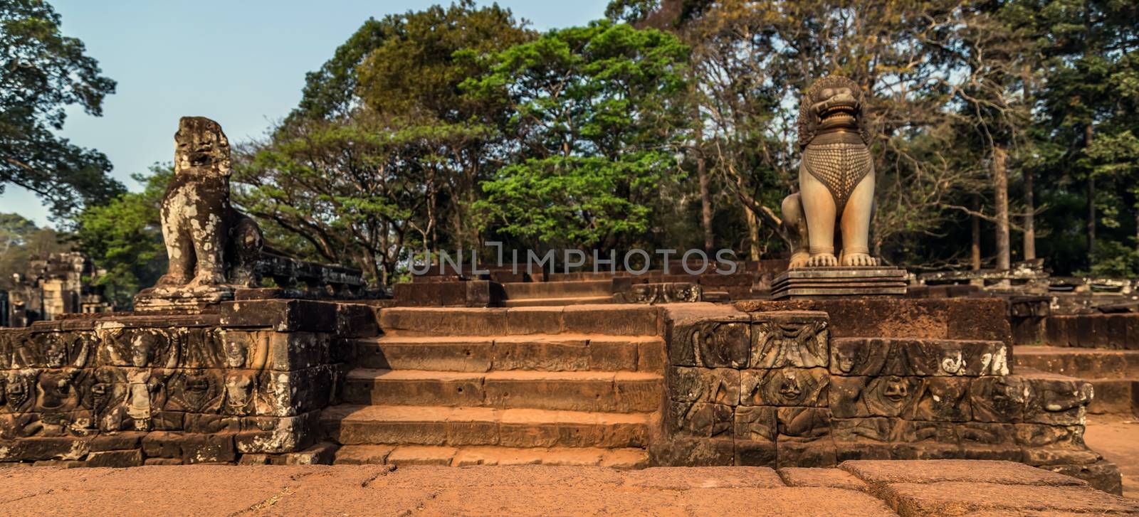 Ancient temple old ruin stone wall of Angkor wat Lost Khmer city in the jungle Siem Reap UNESCO World Heritage Site Cambodia.
