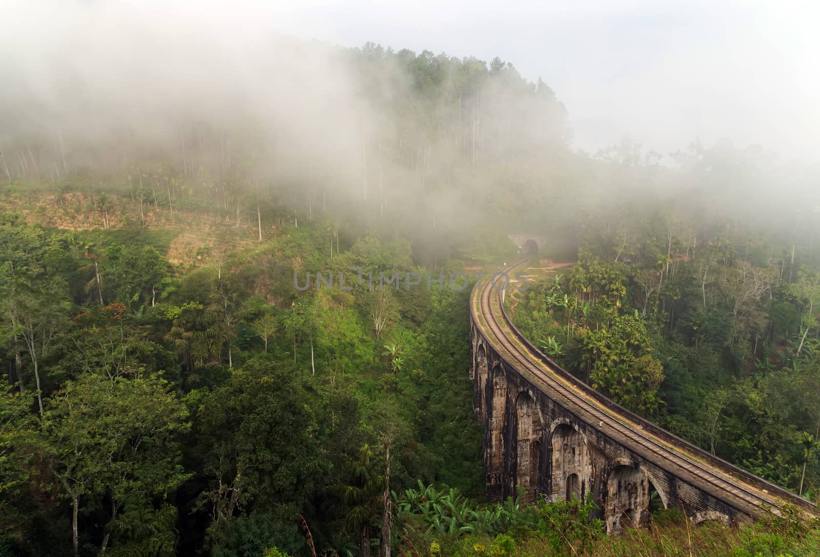 Railroad Nine Arch Bridge in Demodara fog mountain valley landscape