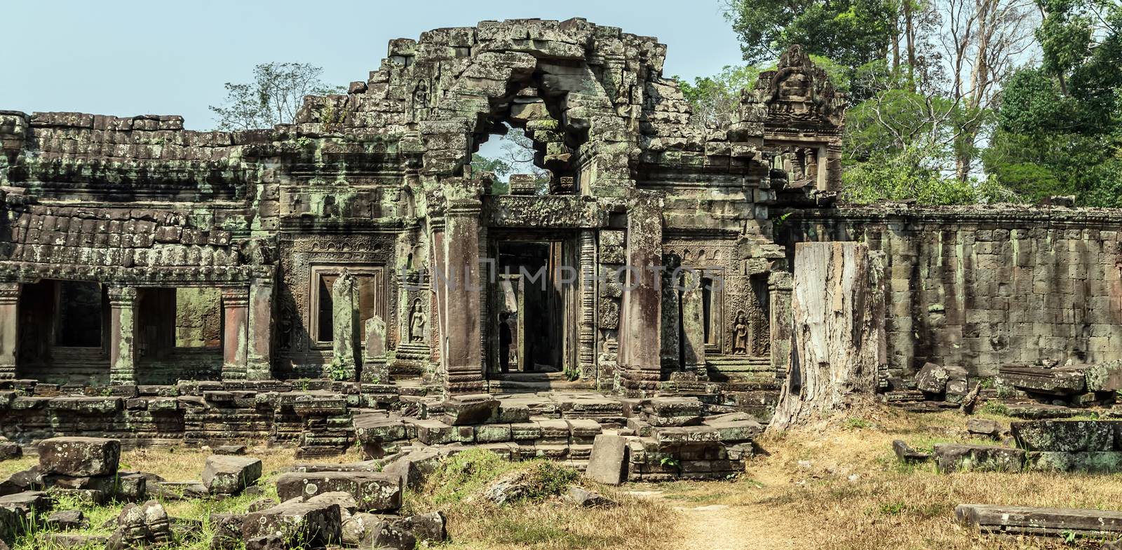 Ancient temple old ruin stone wall of Angkor wat Lost Khmer city in the jungle Siem Reap UNESCO World Heritage Site Cambodia.