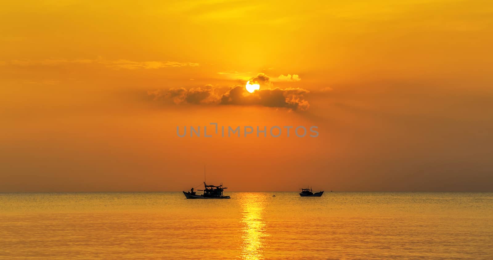 Landscape Sunset sunrise in the sea. Fishing Boat