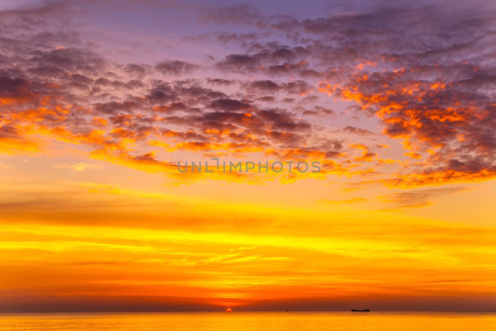 Sunset Gold sea background. Sunset sea waves morning sky. Summer sunset.