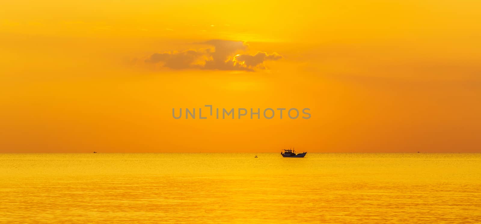 Sky background Sunset fishing boat in the sea