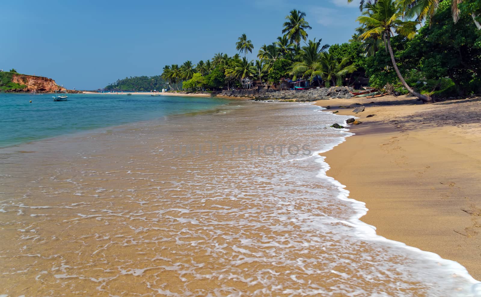Blue sea tide wave Beach sand landscape Mirissa Nature background water tropical island Sri Lanka.