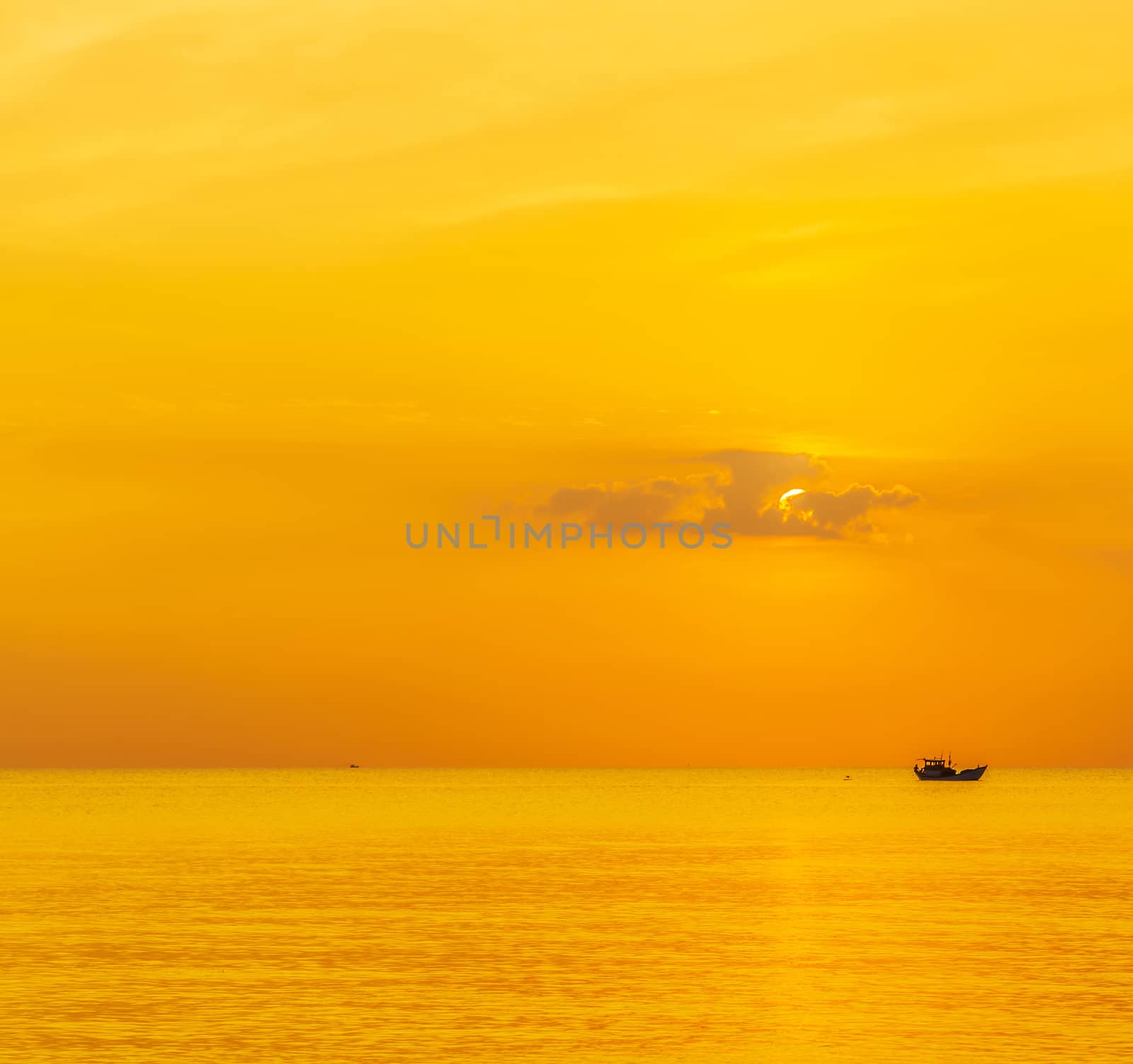 Sky background Sunset on the sea. fishing boat in the sea