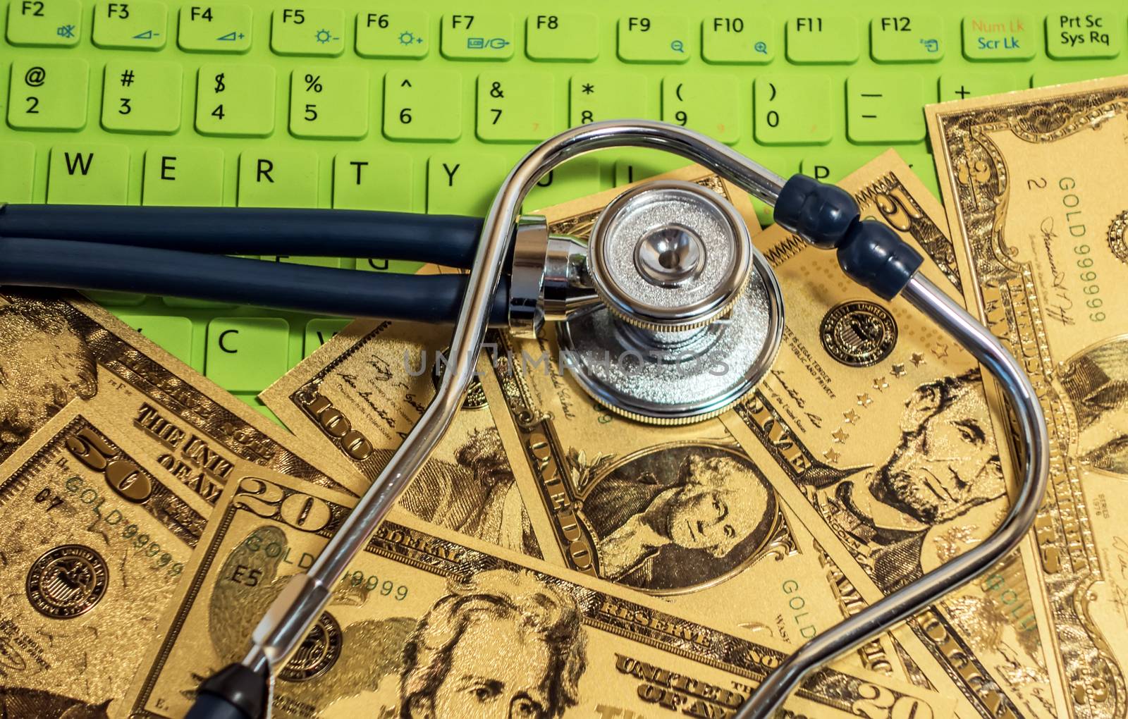 Stethoscope currency cash note bill design american dollars banknotes money gold fake background Finance business economy concept Coronavirus Covid-19