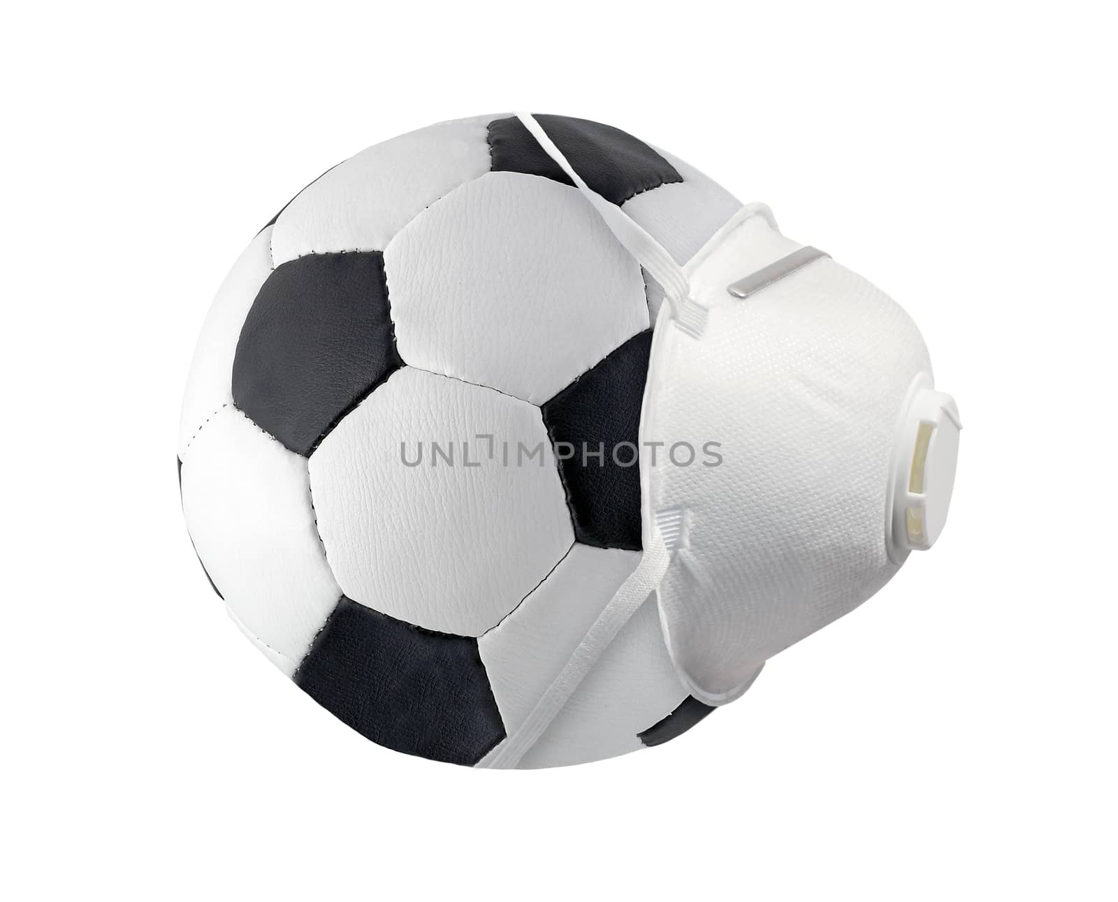 White medical surgical mask on Leather black and white Ball Football Soccerball side view isolated on white background. Face mask KN95 or N95 respirator protection flu virus coronavirus COVID-19.