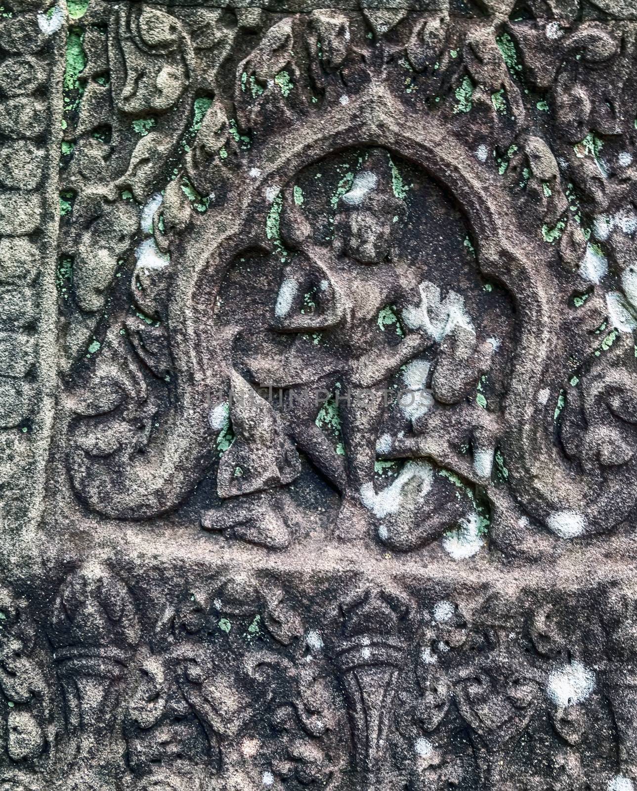 Banteay Srei Bas-reliefs are individual figures jungles of ruins Angkor. Banteay Srey temple Angkorian sites in Cambodia.