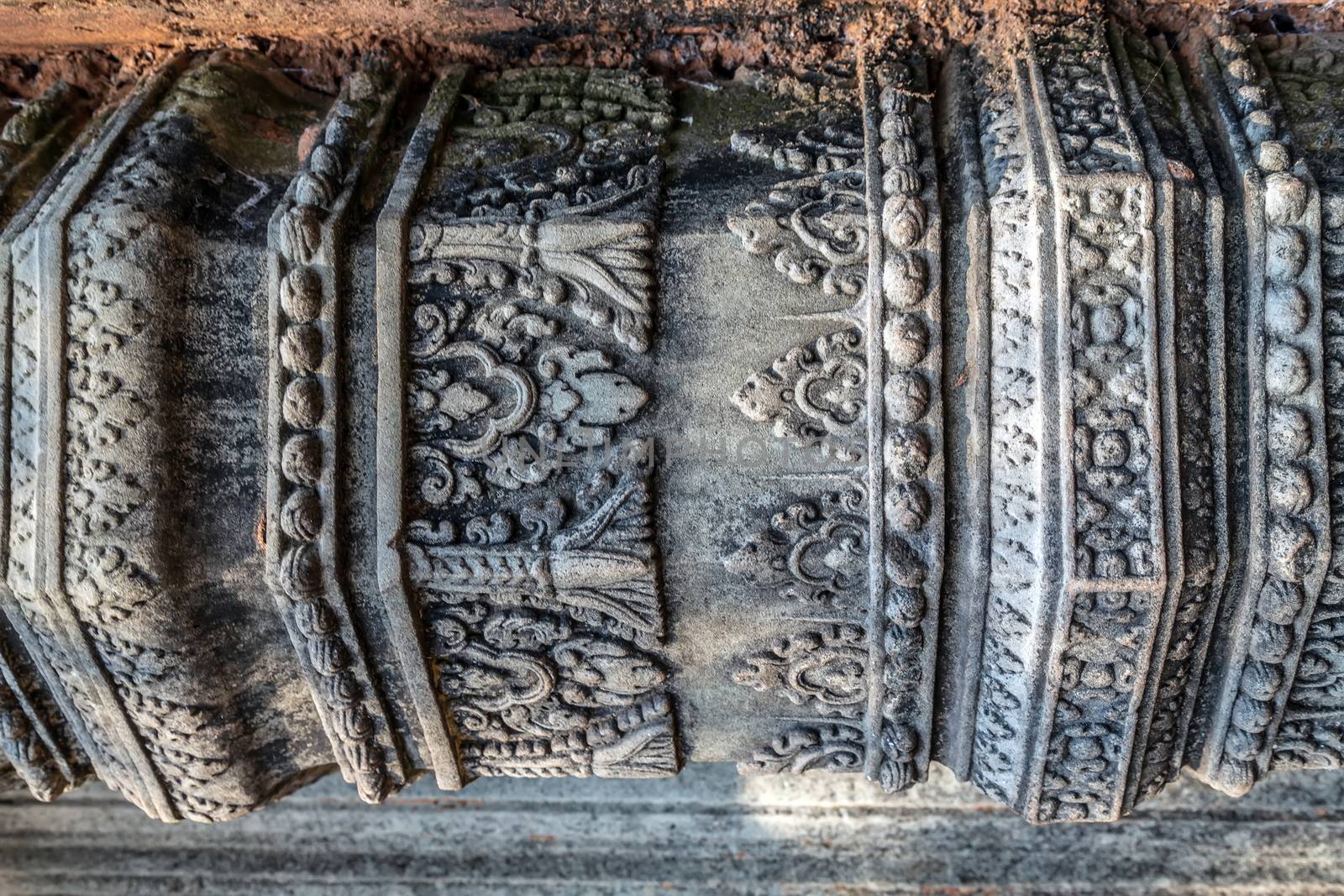 background decorative texture detail carving colonnettes Prasat Pram Temple Koh Ker, Cambodia.
