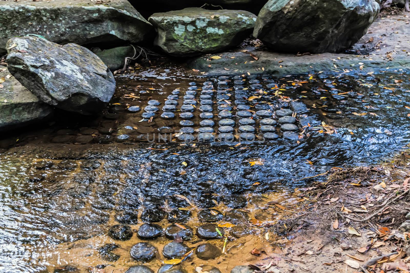 Sahasralingas or 1000 lingas in the rocky bed of Kbal Spean River. Siem Reap, Cambodia Kbal Spean This Cambodian riverbed is covered in ancient fertility symbols both above and below the waters.