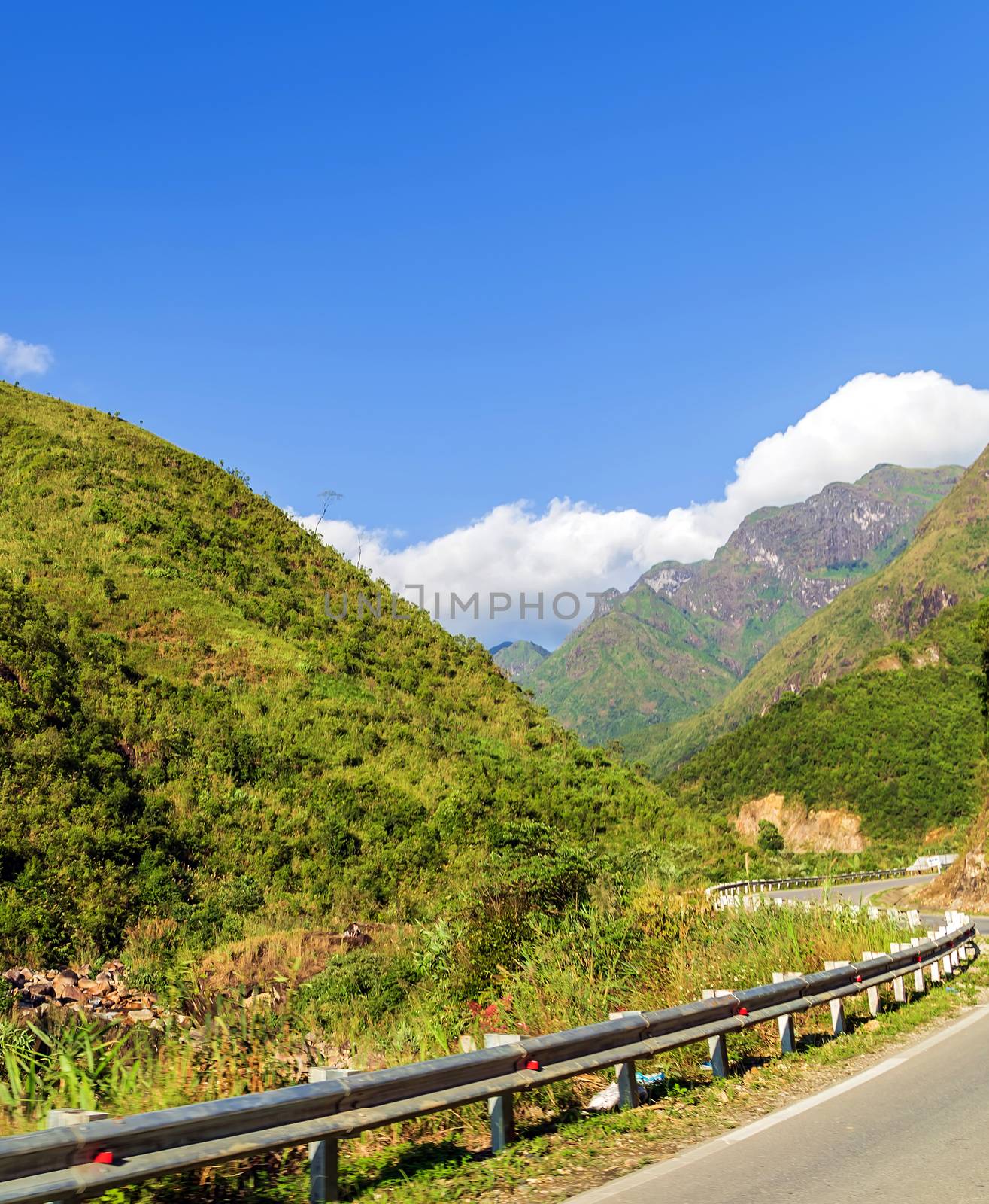 Travel background Highway blue sky in mountains Transportation