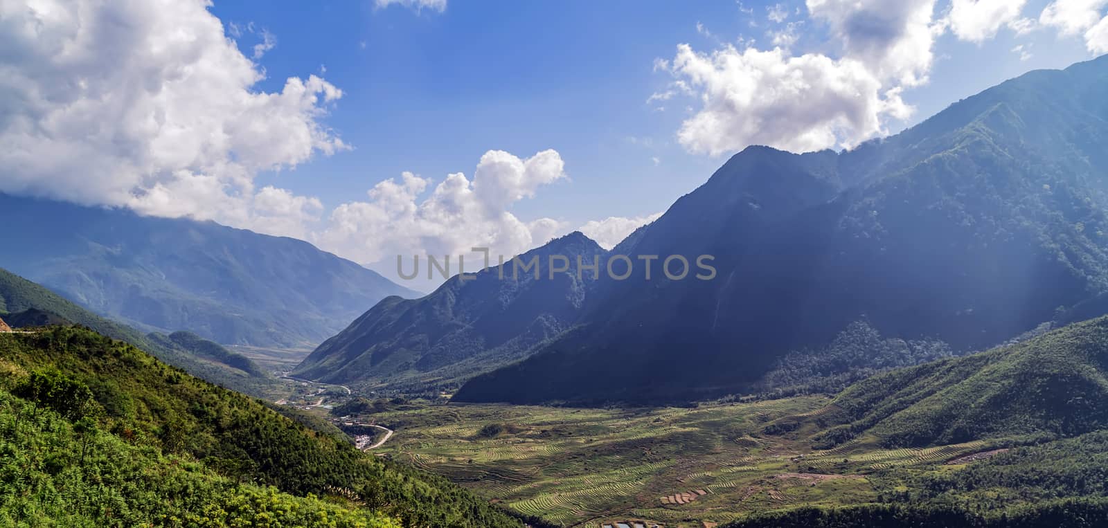 Alps mountain sunny afternoon. Green Wonderful springtime landscape in mountains. Grassy mountain ridge and rolling hills.