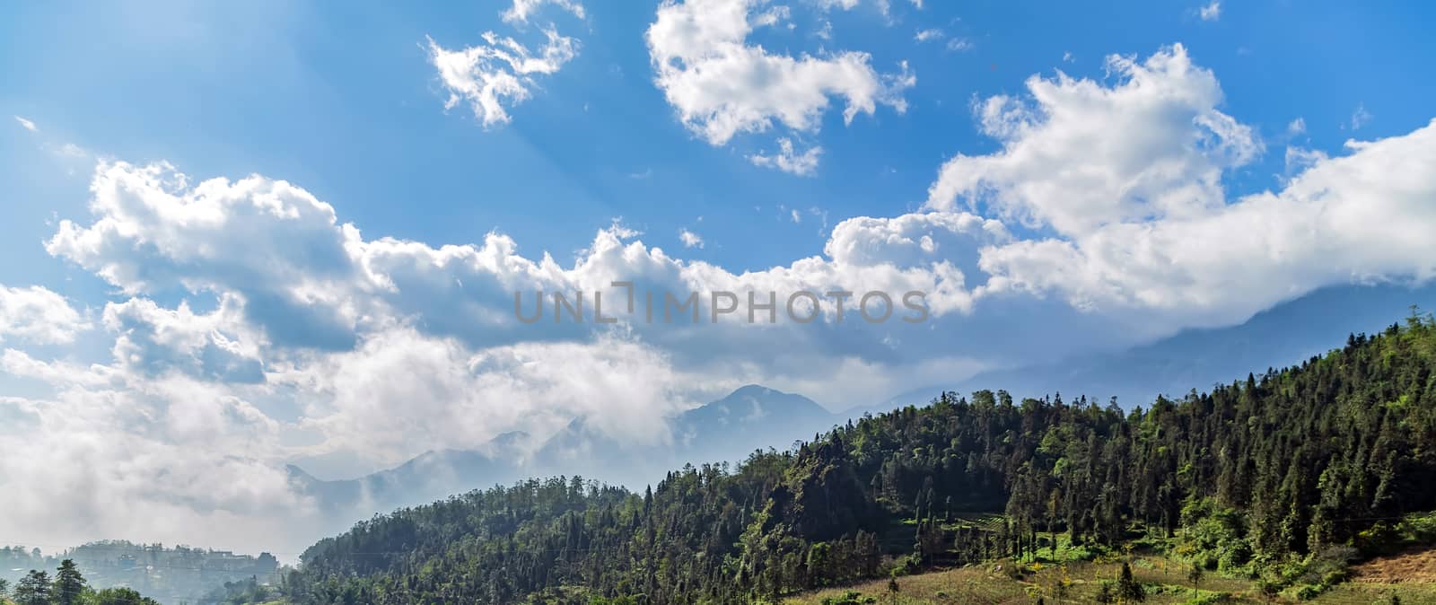 landscape in the mountains at sunset. blue cloudy sky scene.