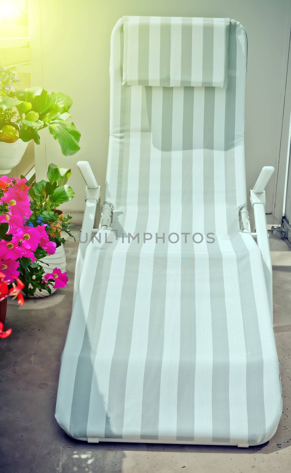 Beautiful sunrise at the sunbead background deck chair