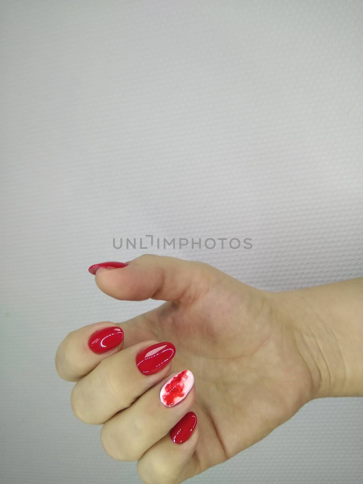 Amazing natural nails. Women's hands with clean manicure. Gel polish applied. by SmirMaxStock