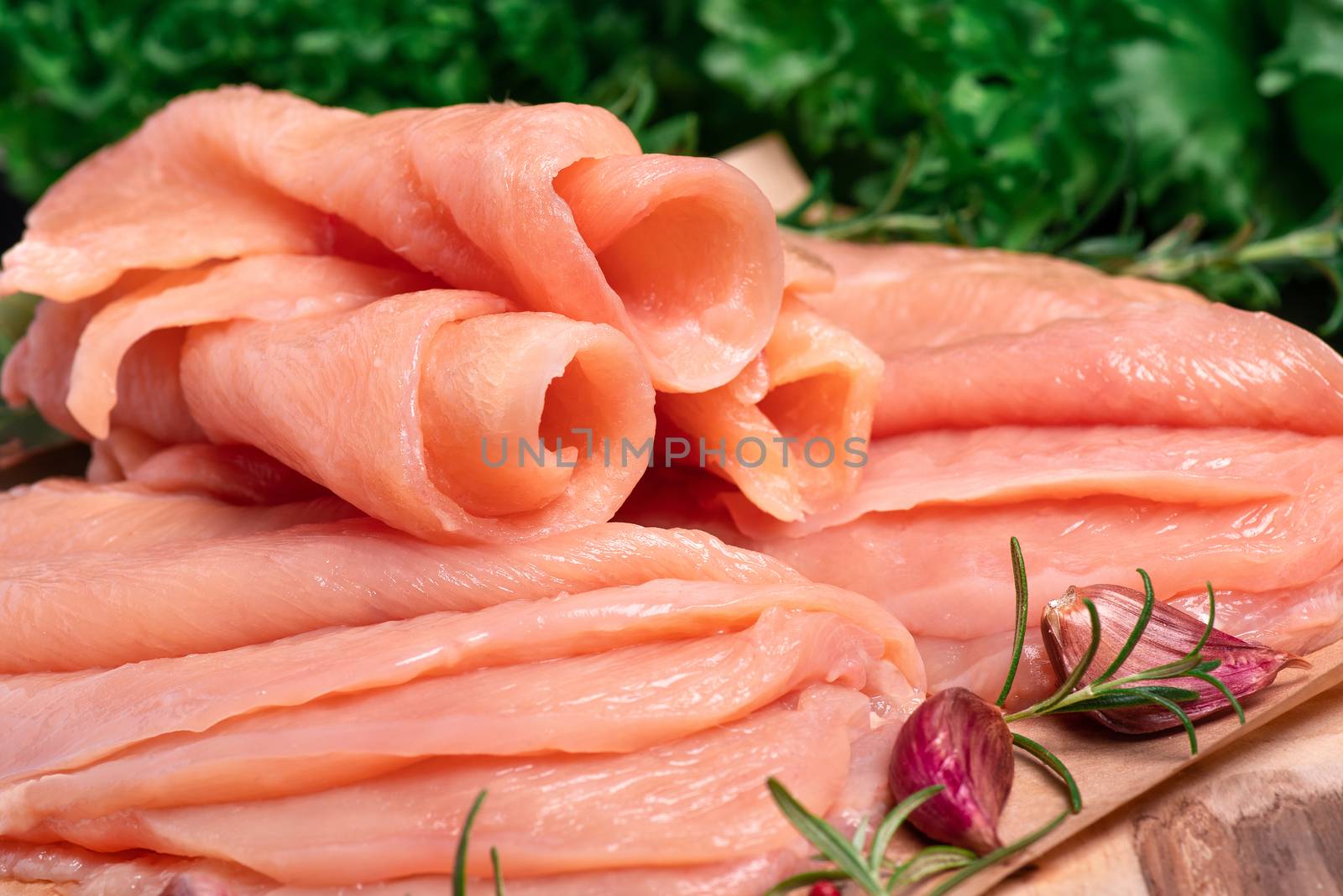 Raw sliced chicken meat close-up. Sotilissimo. Delicious dietary meat. Cooking,food of meat and fillets.