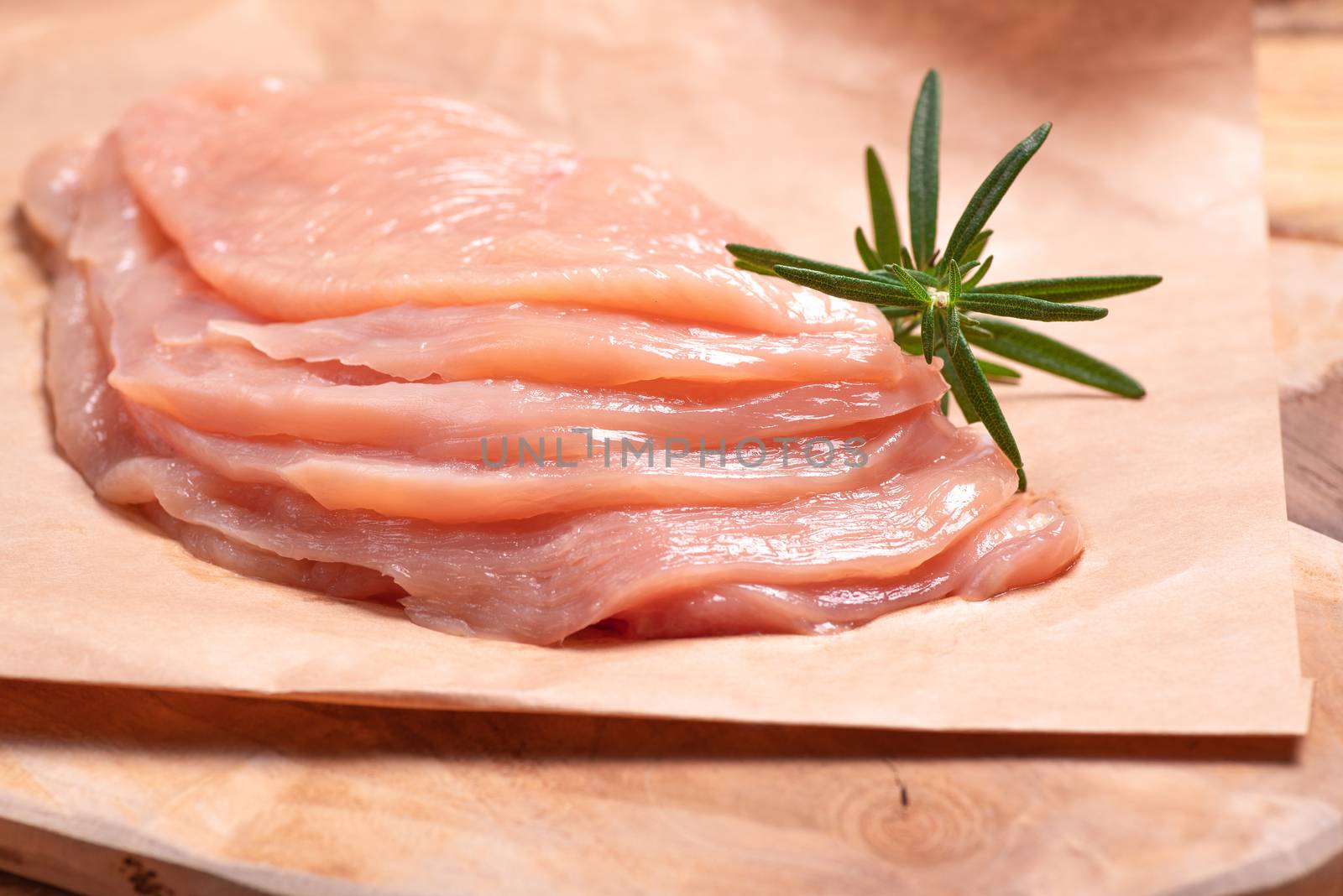Raw sliced chicken meat close-up. Sotilissimo. Close-up view of raw, fresh, choped and sliced chicken meat.Delicious dietary meat. Cooking. by nkooume