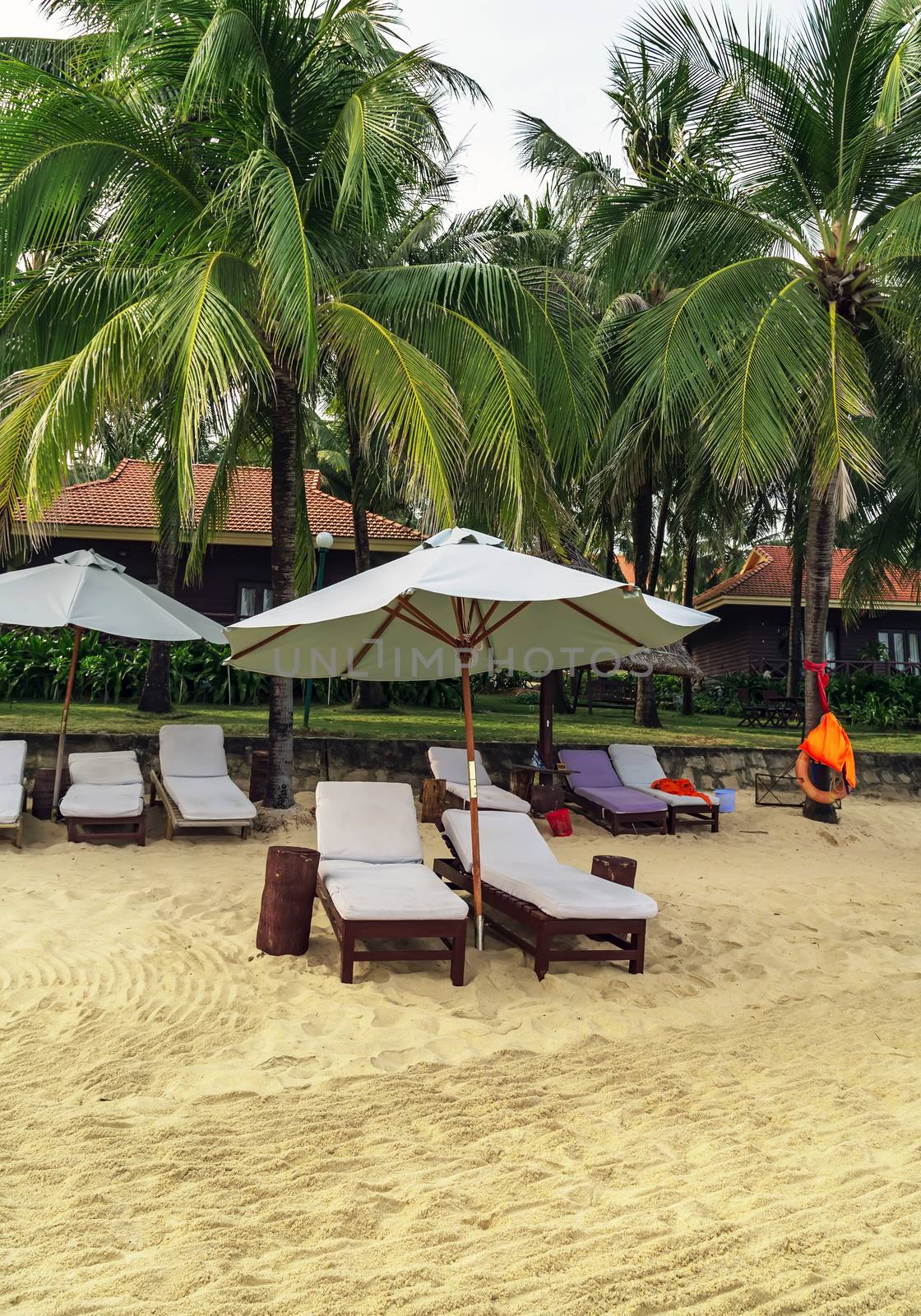 Morning on the beach chairs and white umbrella relax Leisure at sea Phu Quoc island in Vietnam. scene vacation and summer holiday concept.