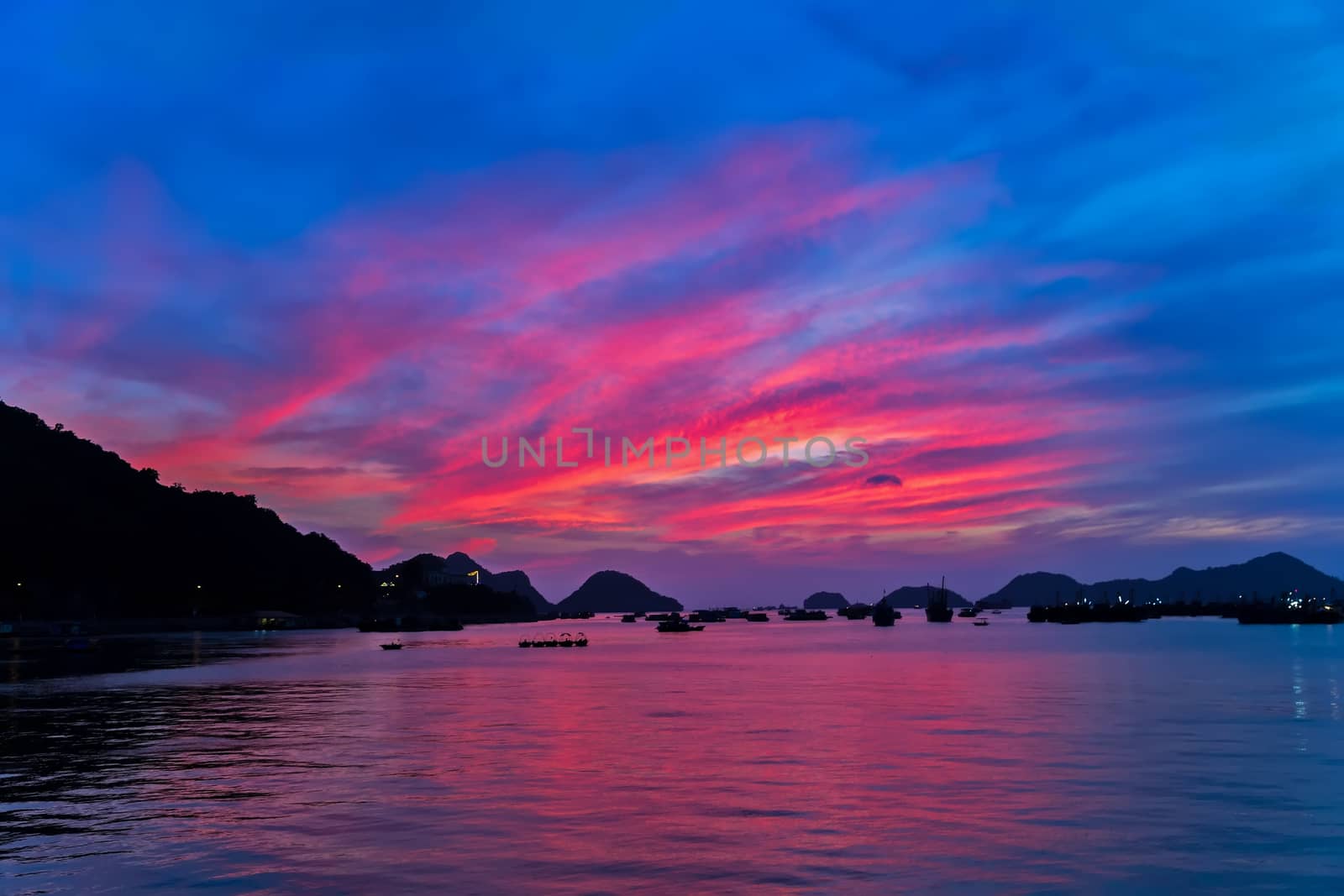 pink Sunset Halong Bay from Fort Cannon on Cat Ba Island, Vietnam. Tourism travel, vacation concept tropical nature background
