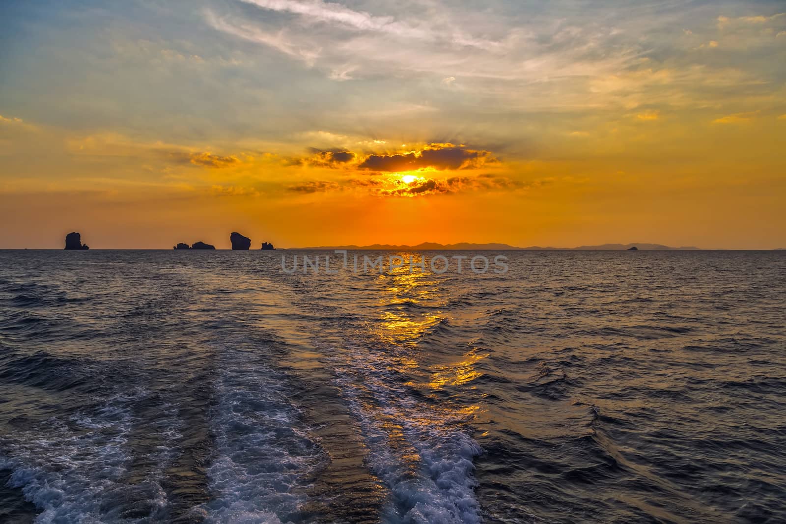 Sea Sunset evening island. Beauty Scene or sun over colorful sky with clouds Seascape. Tourism travel, vacation concept tropical nature background