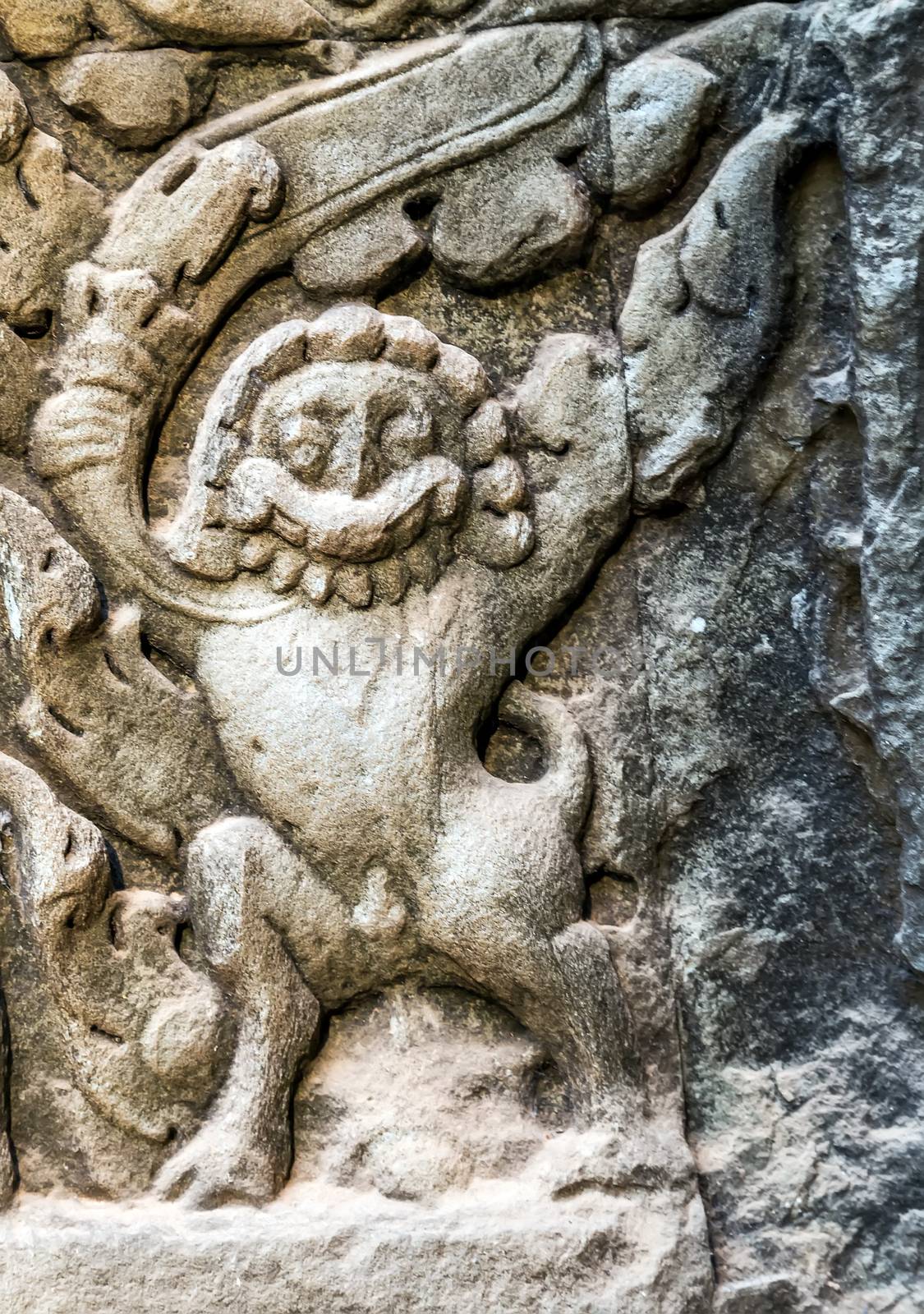 art of ancient Hindu god stone background, detail of the architecture in Bantey Srei temple in the Angkor area, Cambodia.