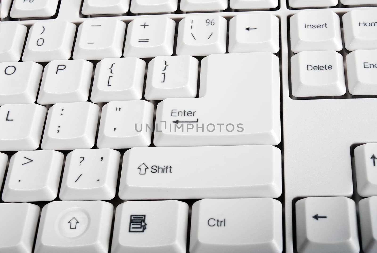 Computer white keyboard closeup Enter Shift by Vladyslav