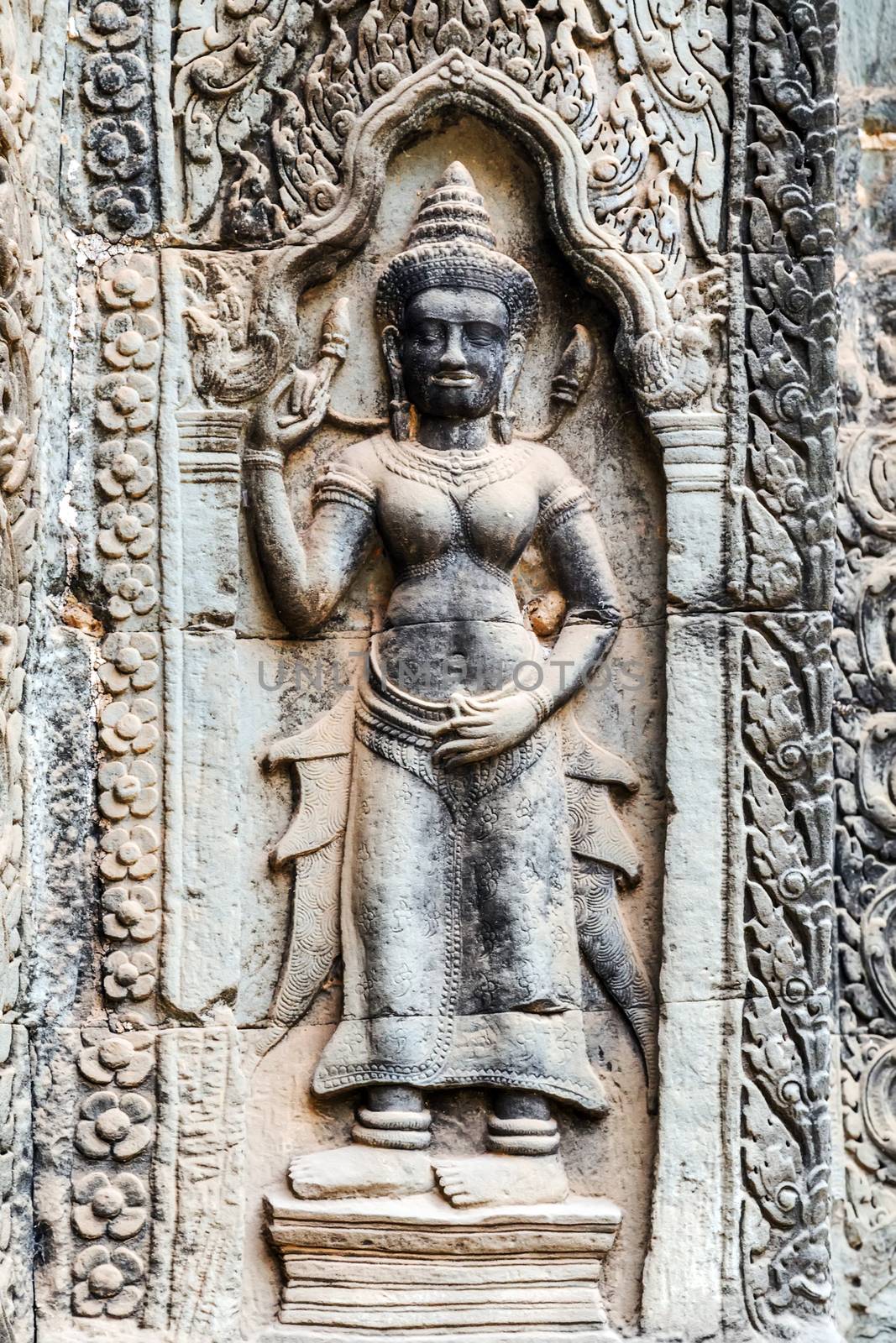 Dancing Apsara Decoration Stone Carving on the wall of Angkor wat, Seam Reap, Cambodia